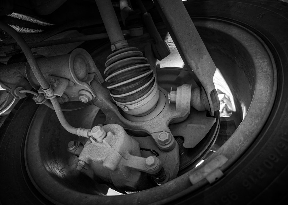 Vehicle suspension and subframe