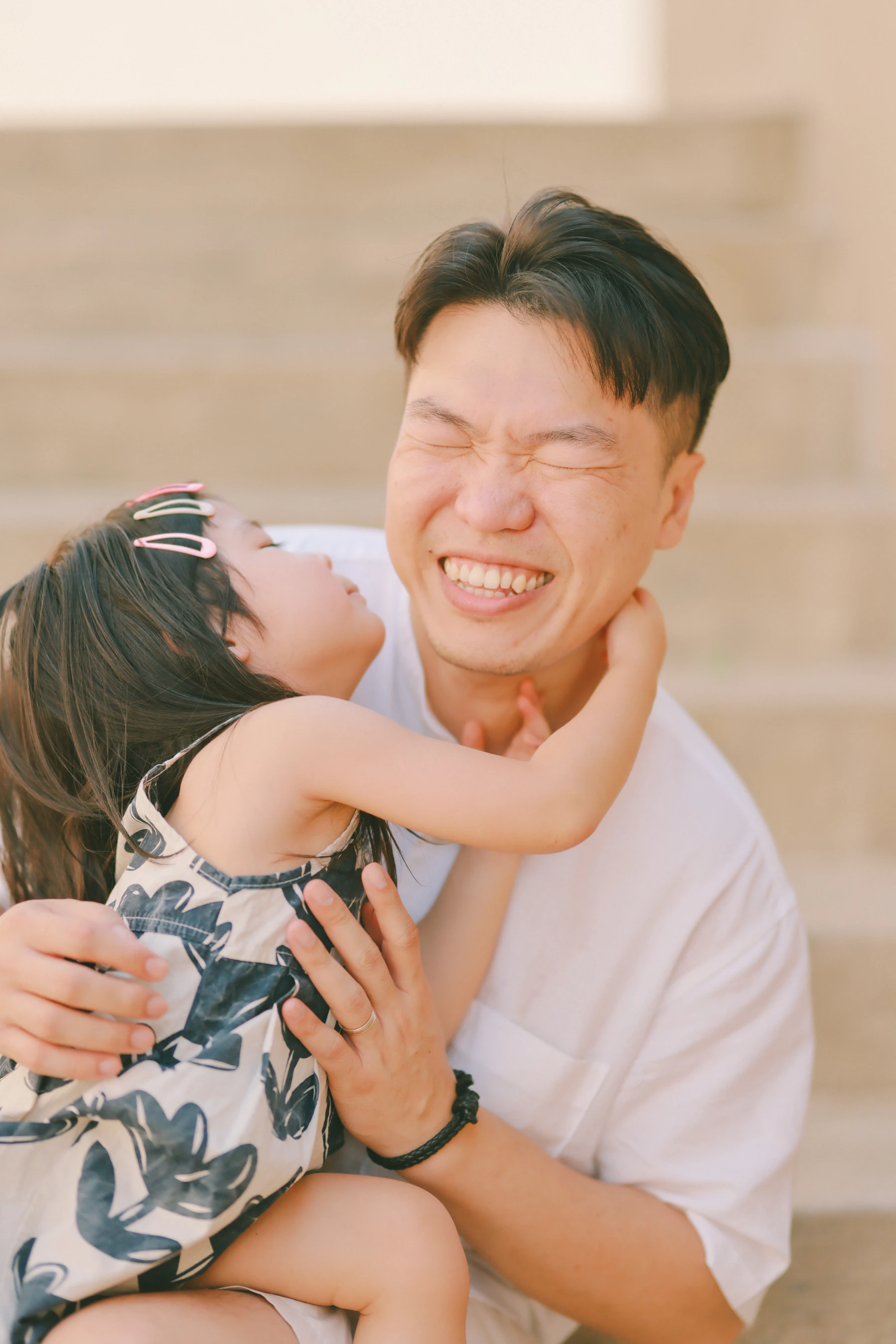 Father and daughter sharing a tender family moment