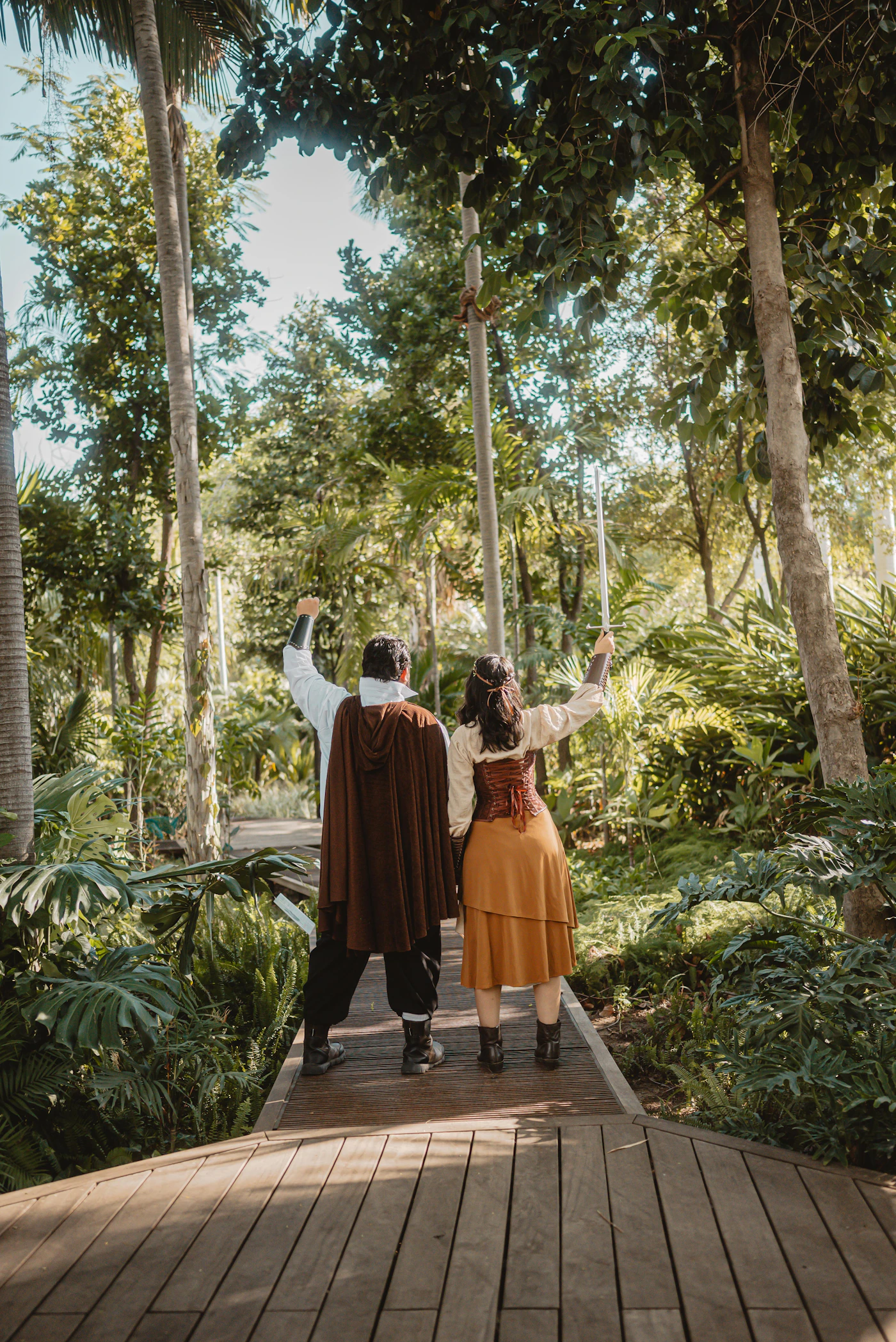 Couple on a night excursion boat on the Ecuadorian Amazon with the dark river and the primary jungle on both banks surrounding them after their elopement ceremony