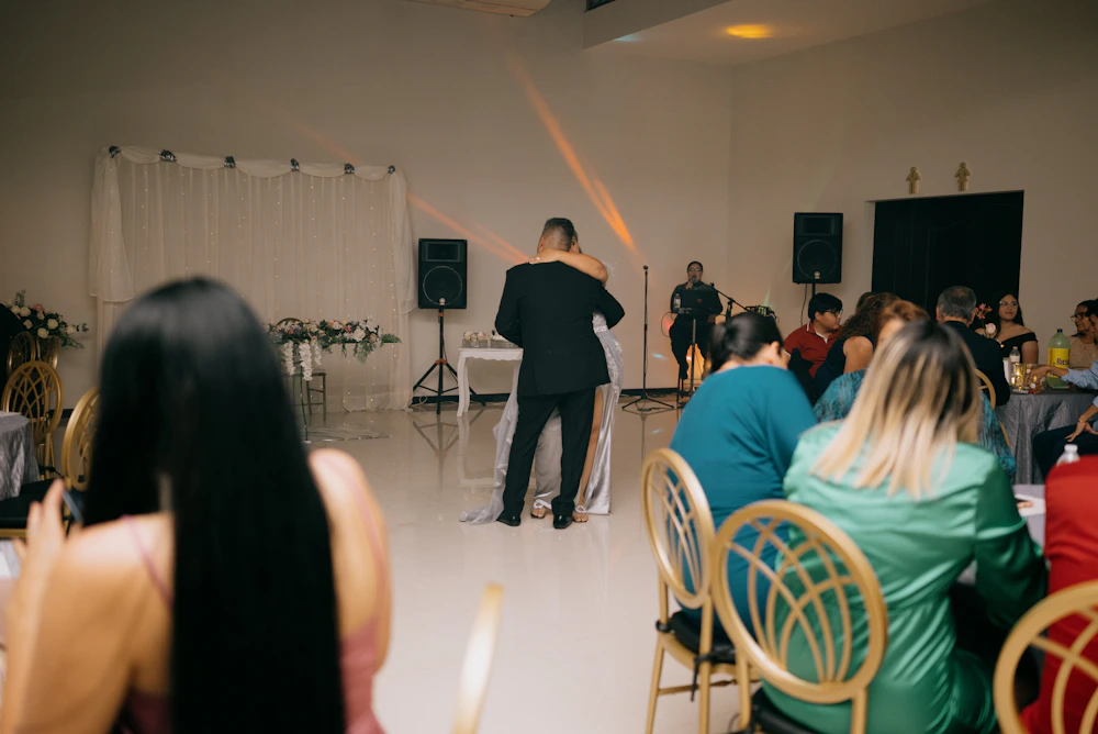 Wedding guests celebrating with the couple