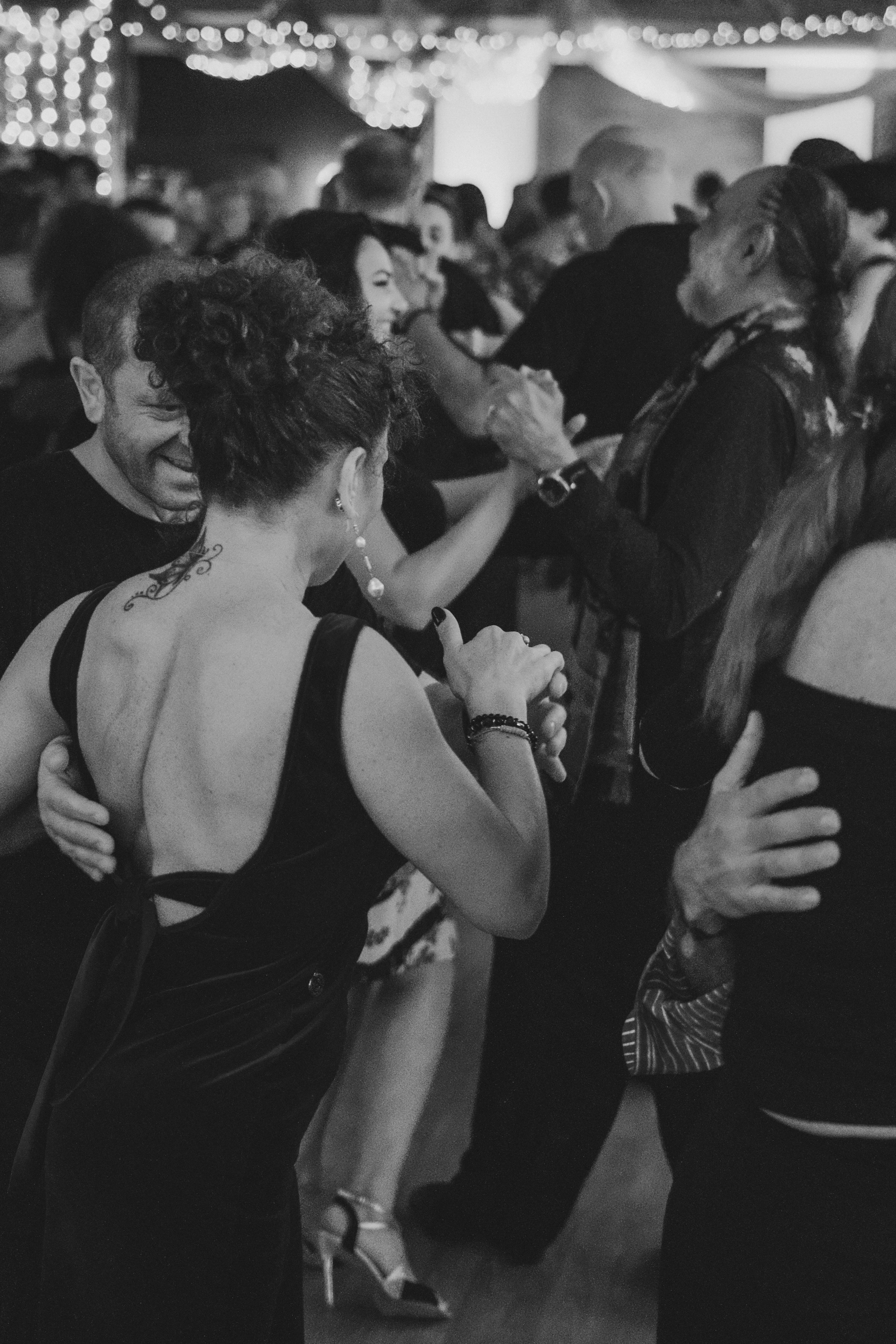 Couples dancing together at a formal event