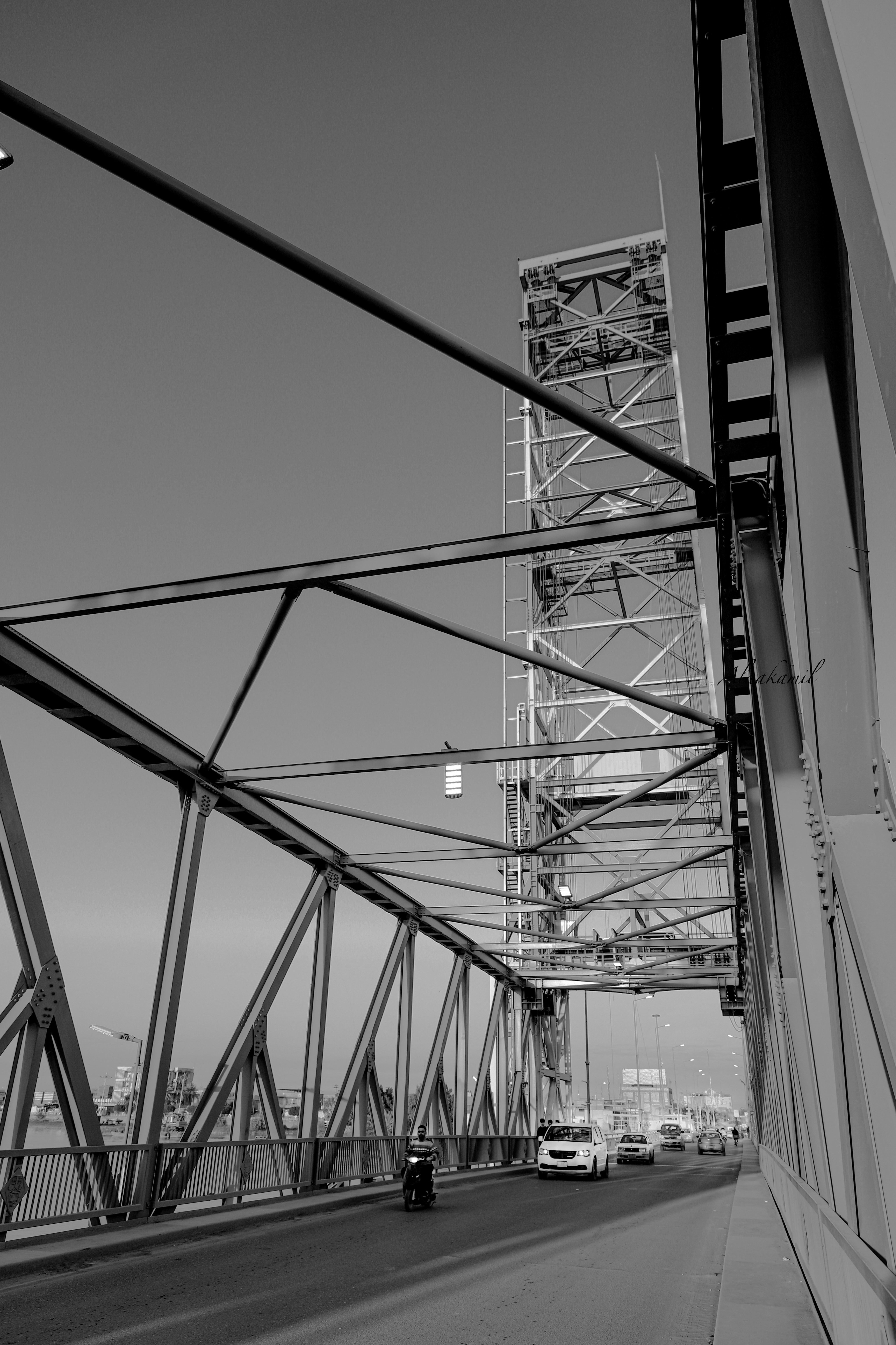 An engineer working on a complex automotive design on a computer.
