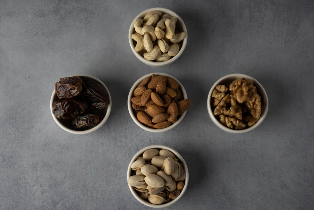 Bowls of dates and assorted nuts