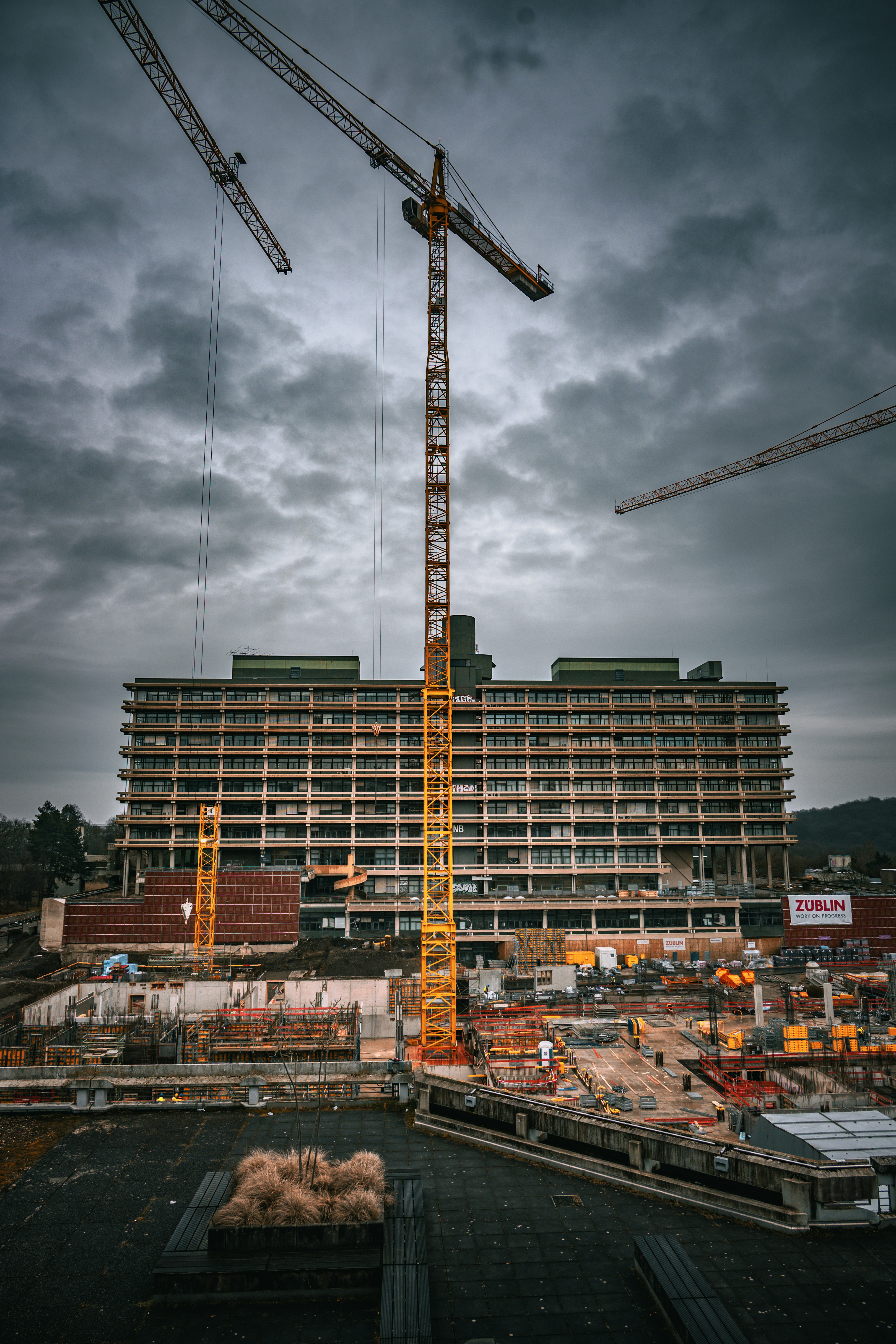 Construction management team coordinating on an active build site
