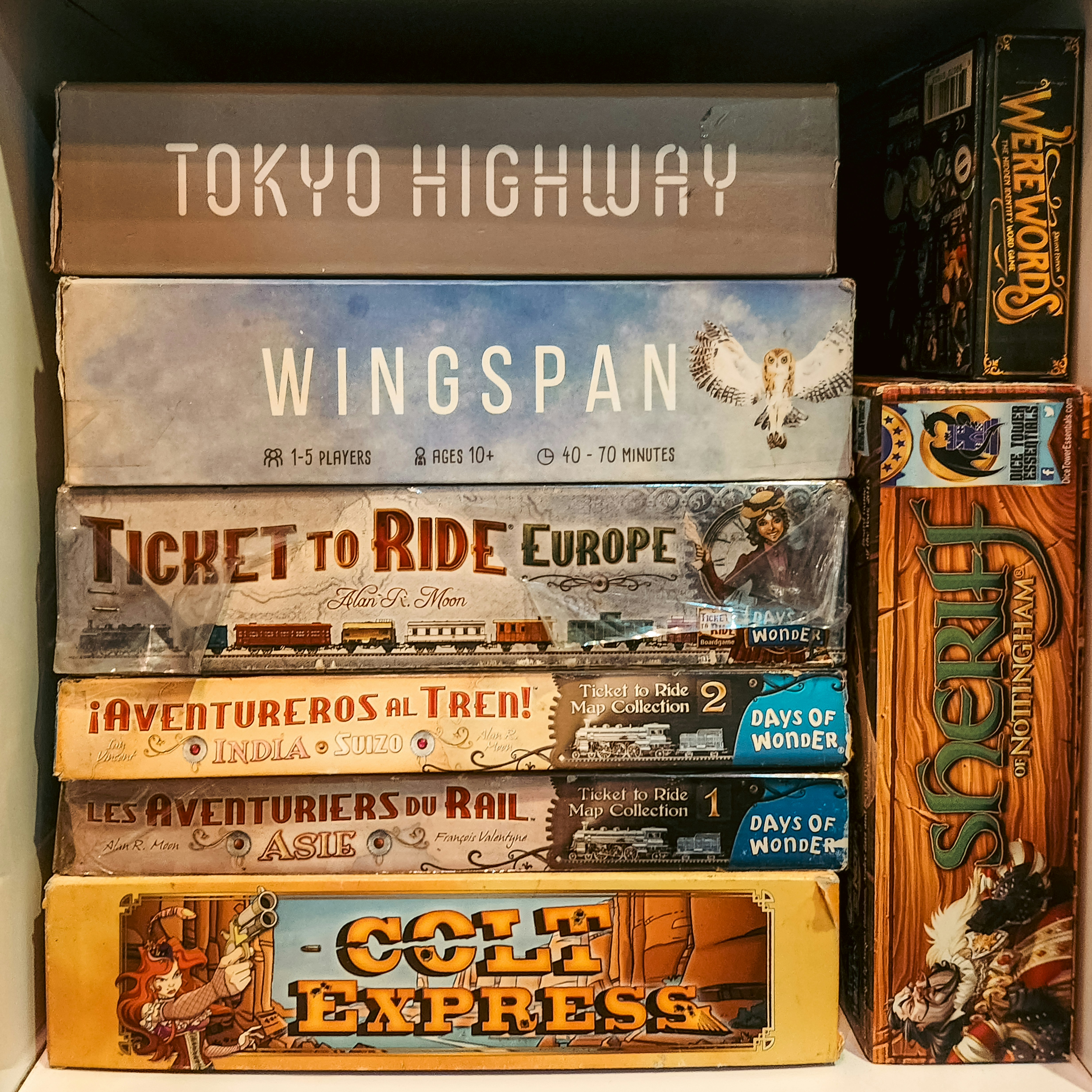 Shelf filled with board games and tabletop games