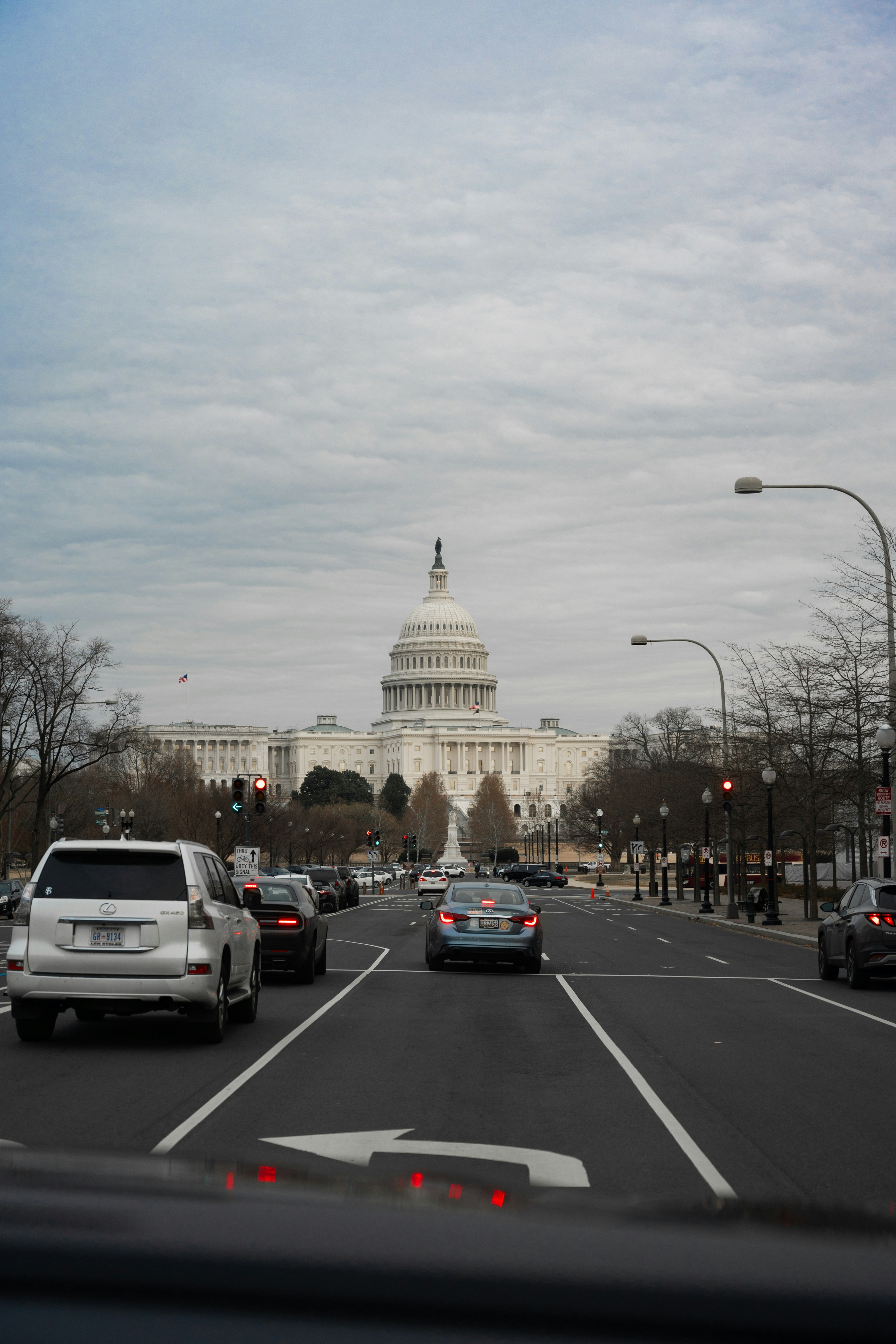 Cars driving towards the us capitol building