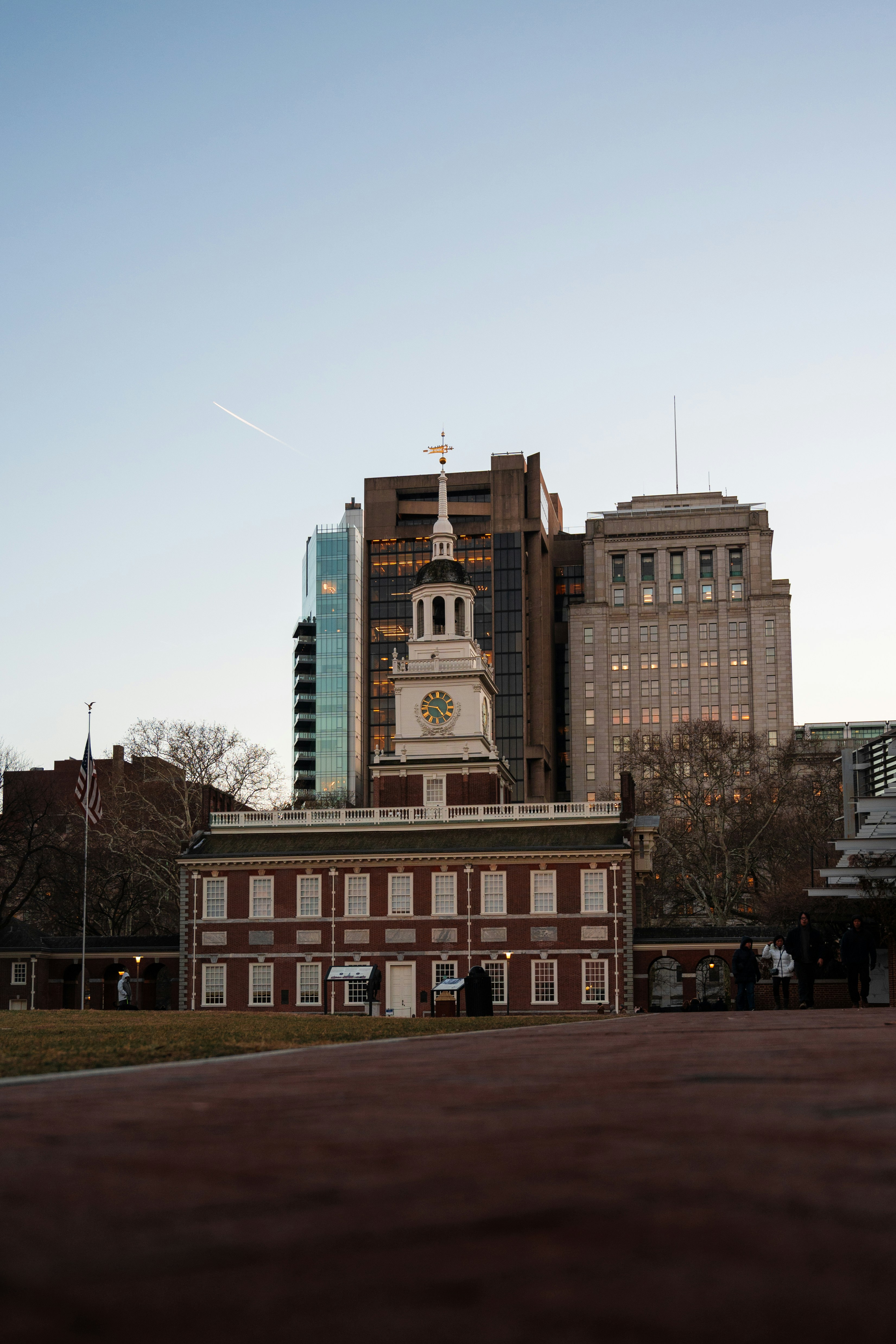 Independence hall building with modern skyscrapers behind