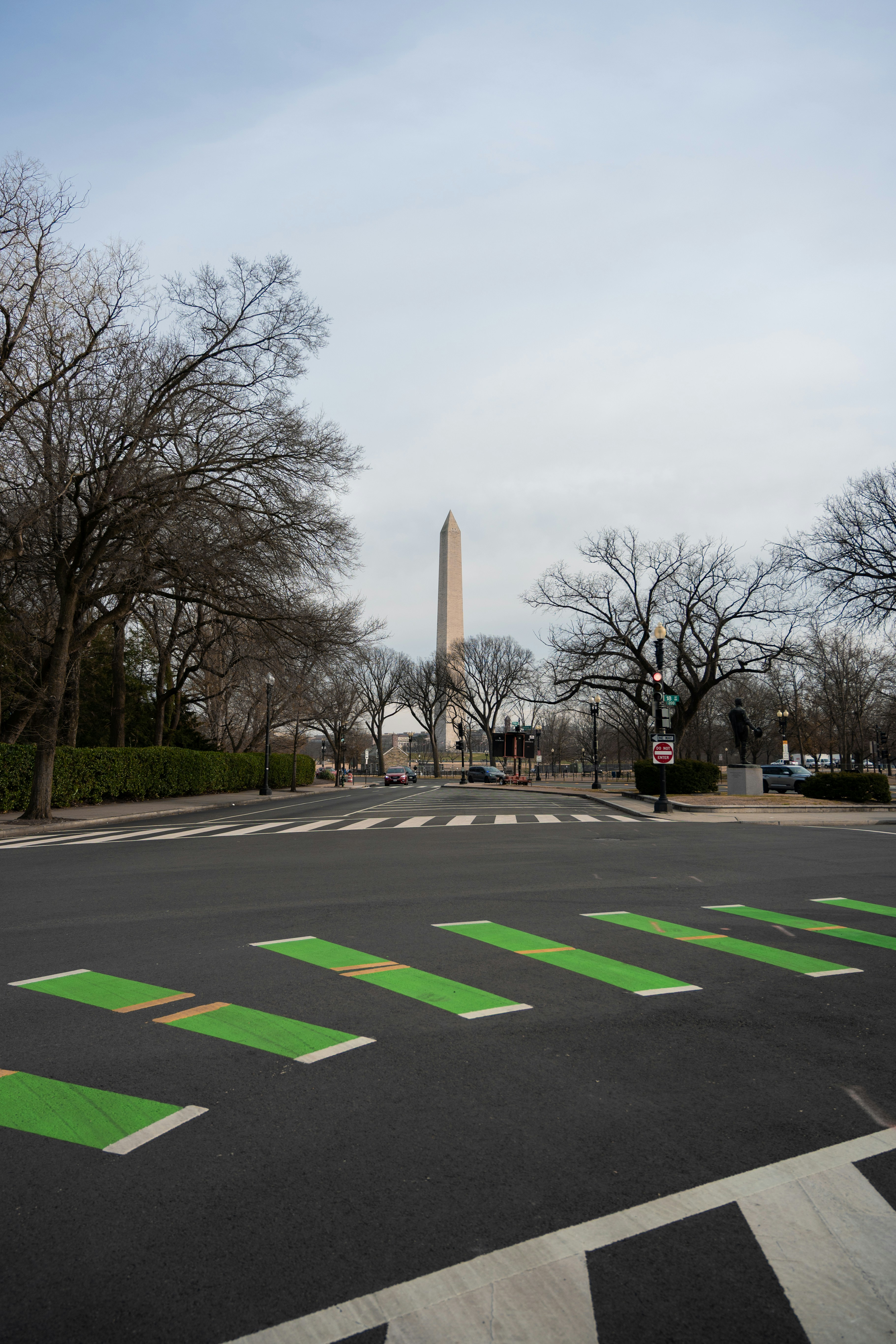 Washington monument viewed from a street crossing