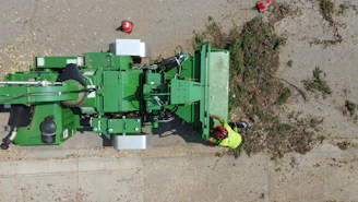 Green agricultural machine processing plant material
