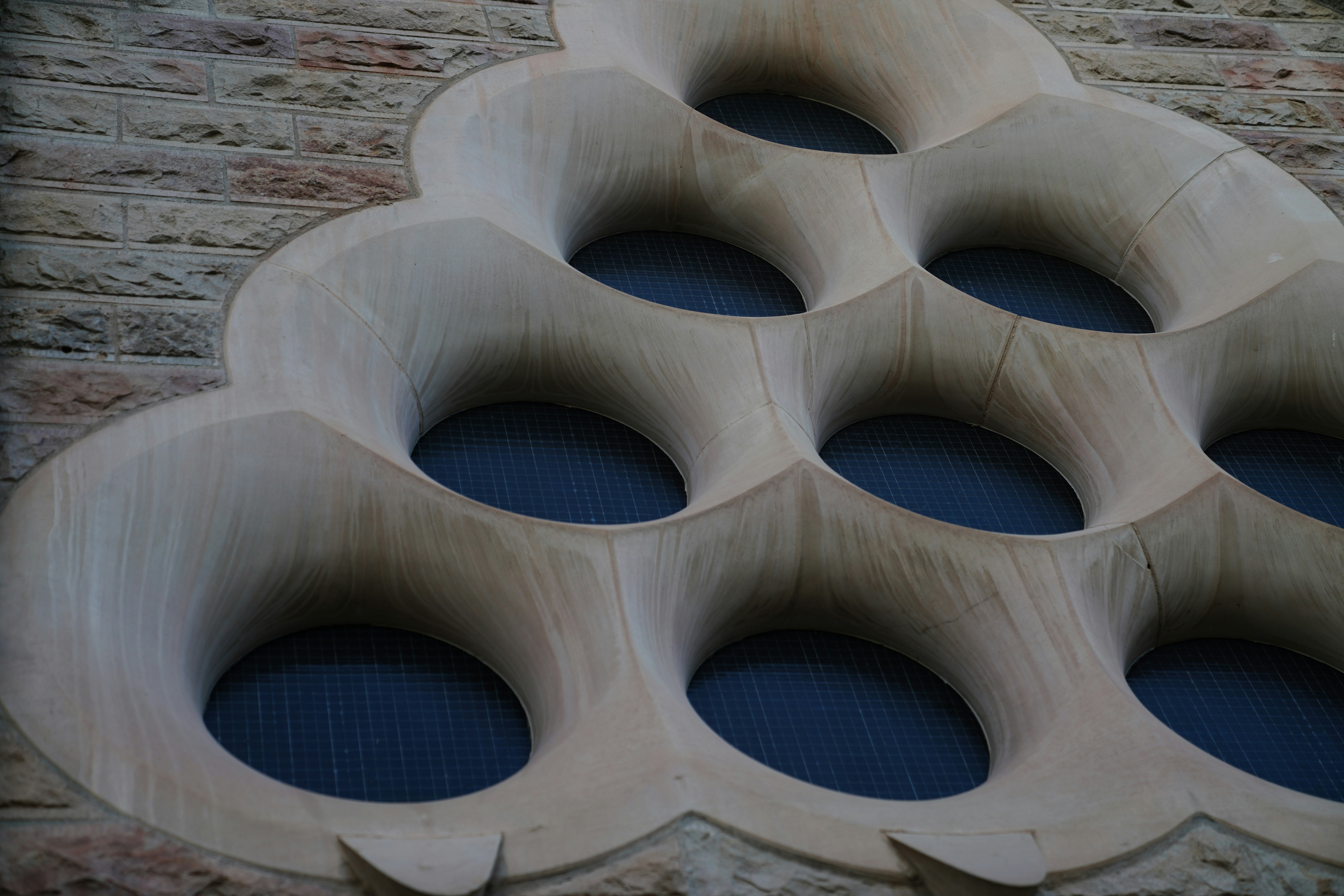 Architectural detail with repeating oval window shapes