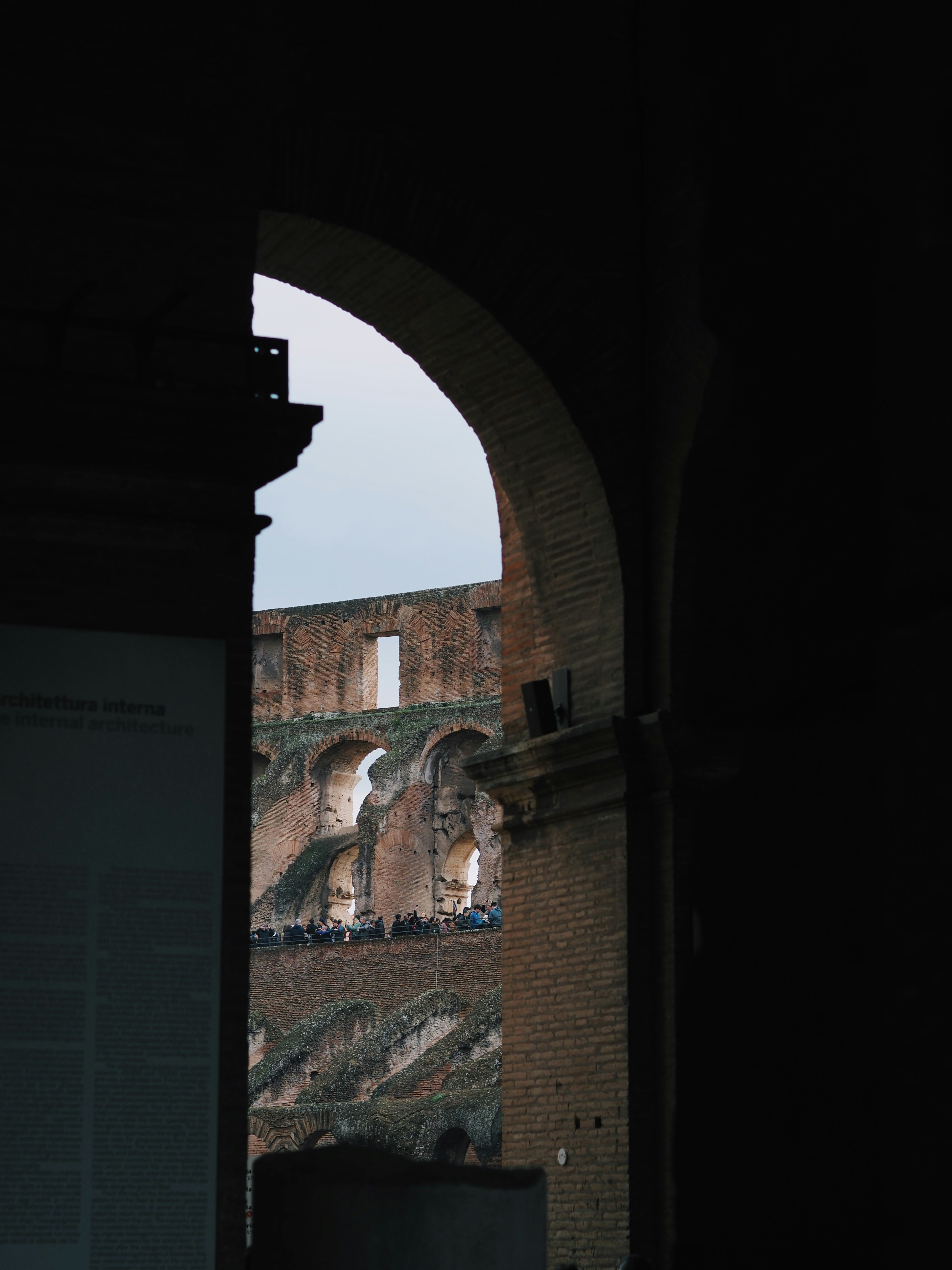 View through archway of ancient roman colosseum