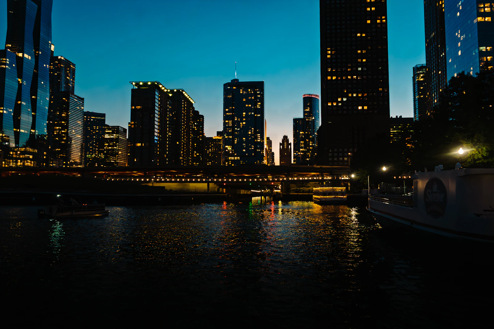 Chicago skyline at night reflected in the water