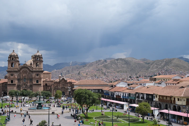 Cusco's Plaza de Armas with the cathedral and the Andes rising behind