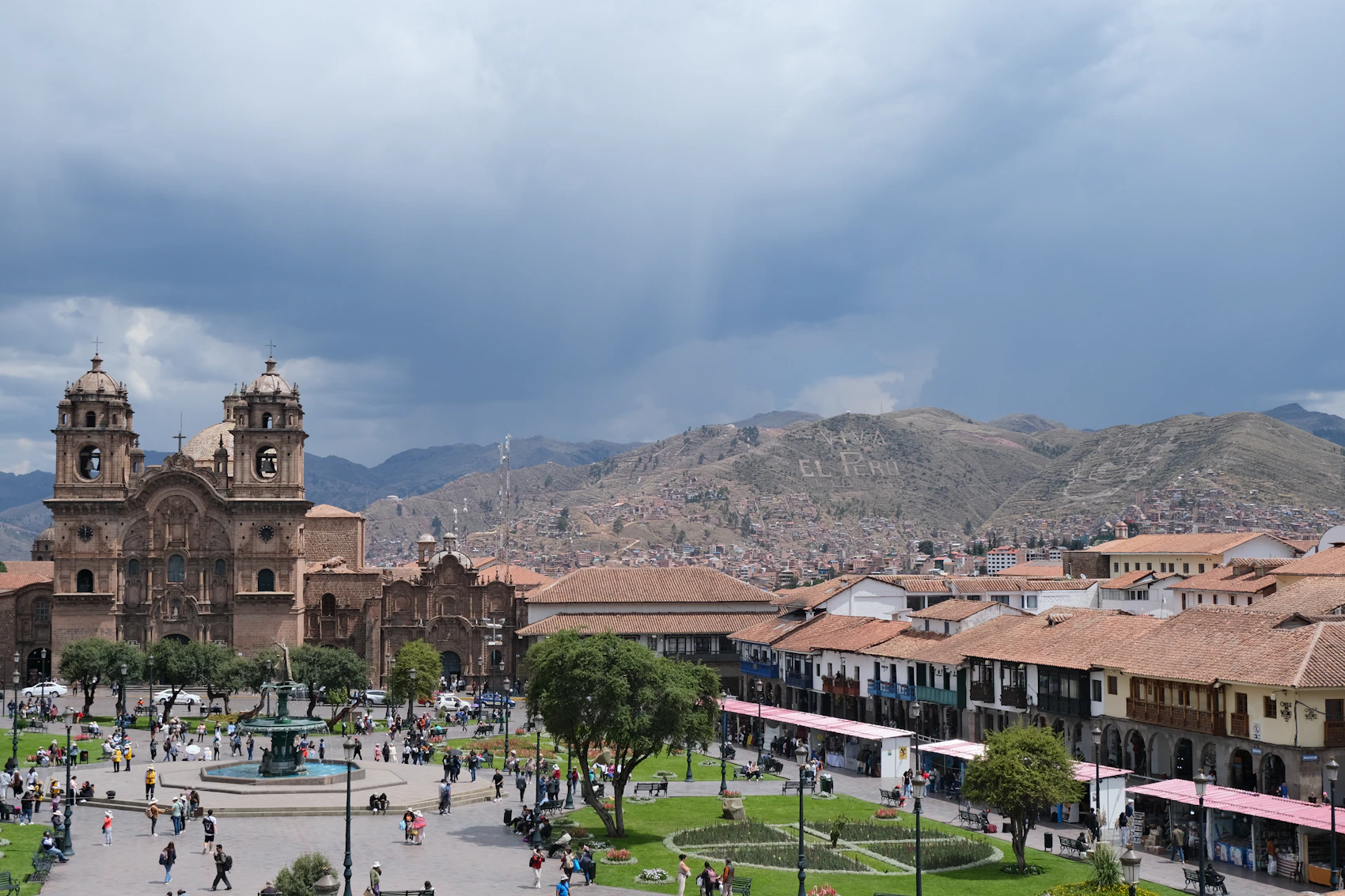 The cathedral and mountain backdrop of Plaza de Armas in Cusco