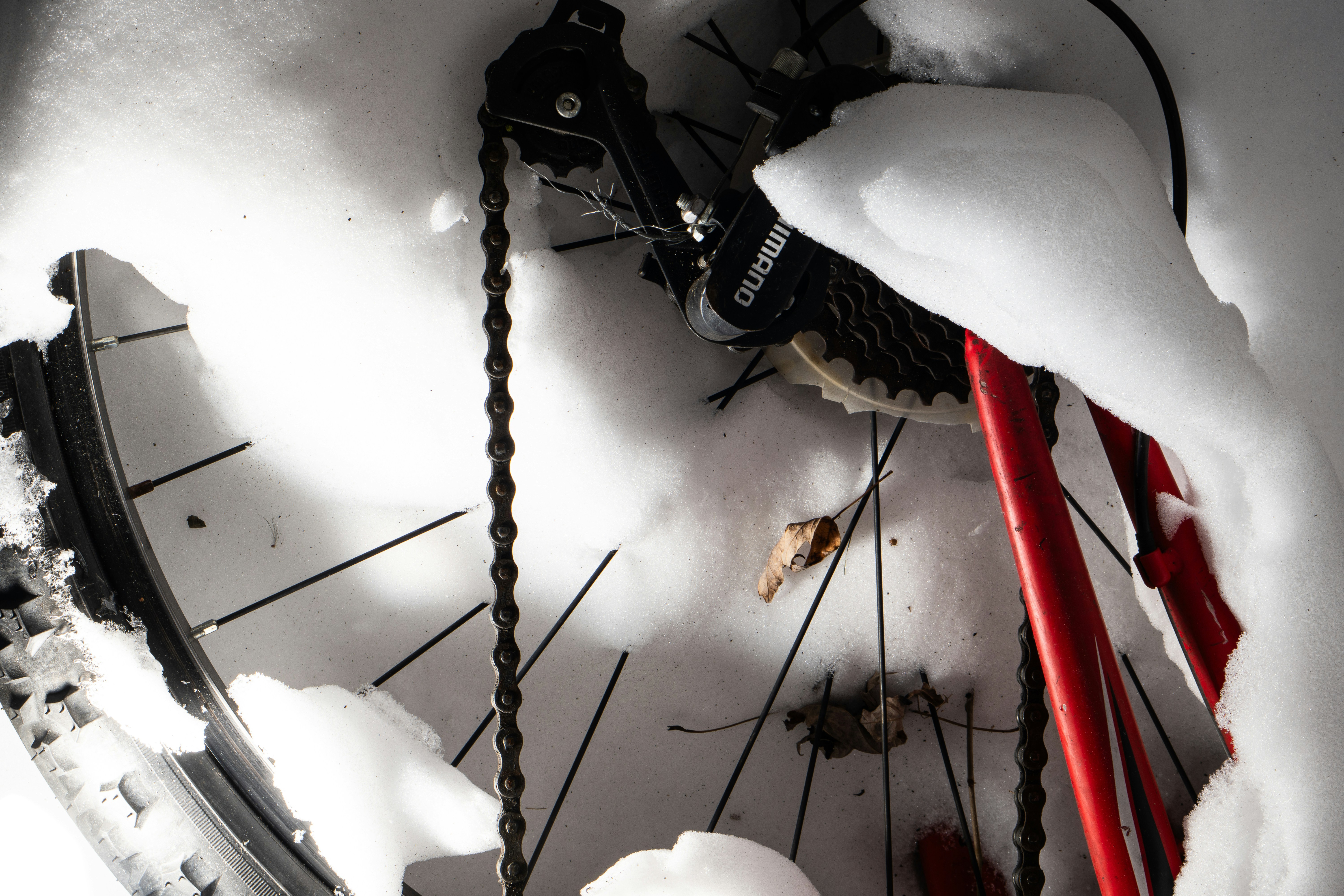 Bicycle gears and chain covered in snow