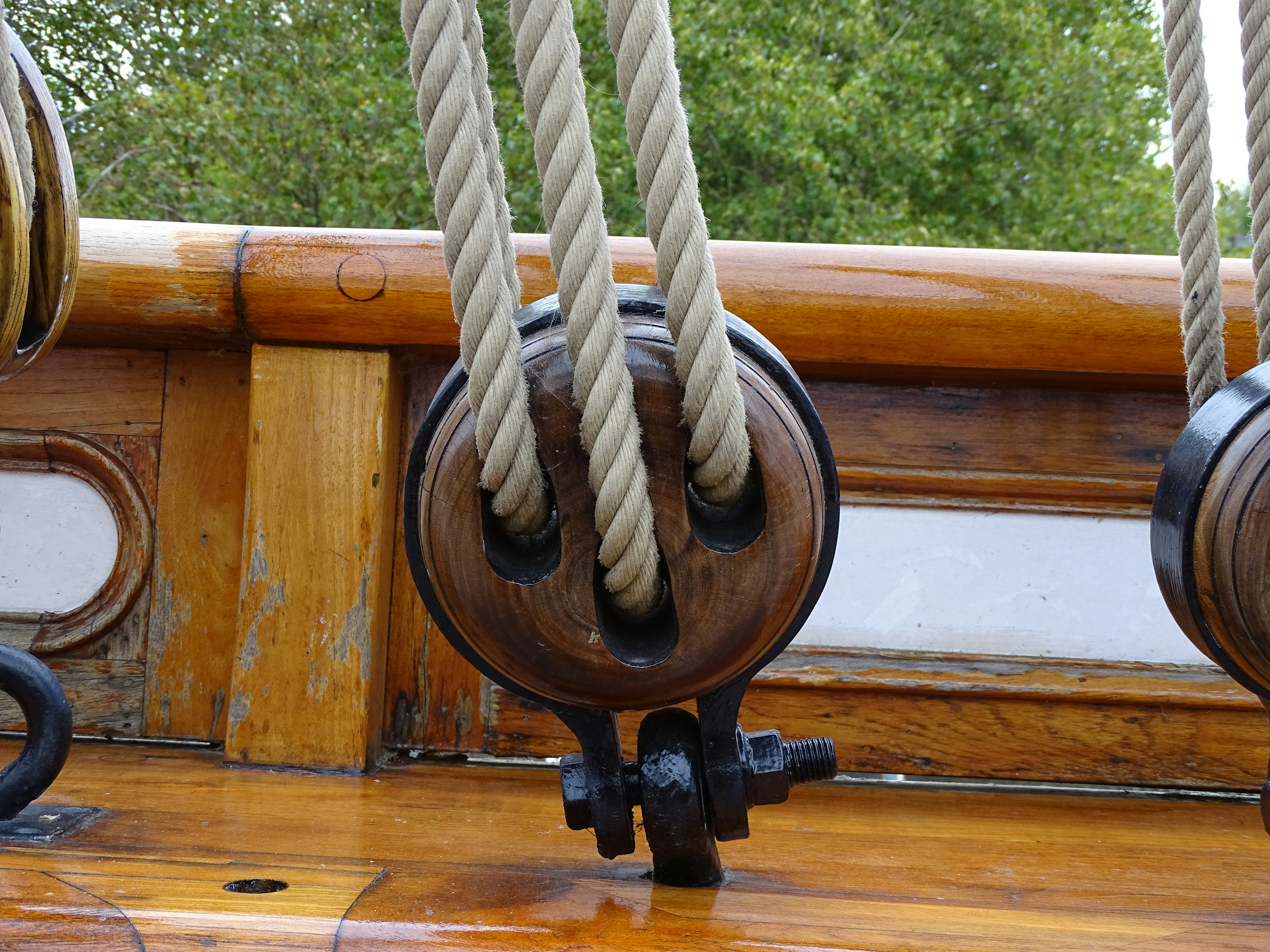 Wooden block and tackle on a sailboat deck