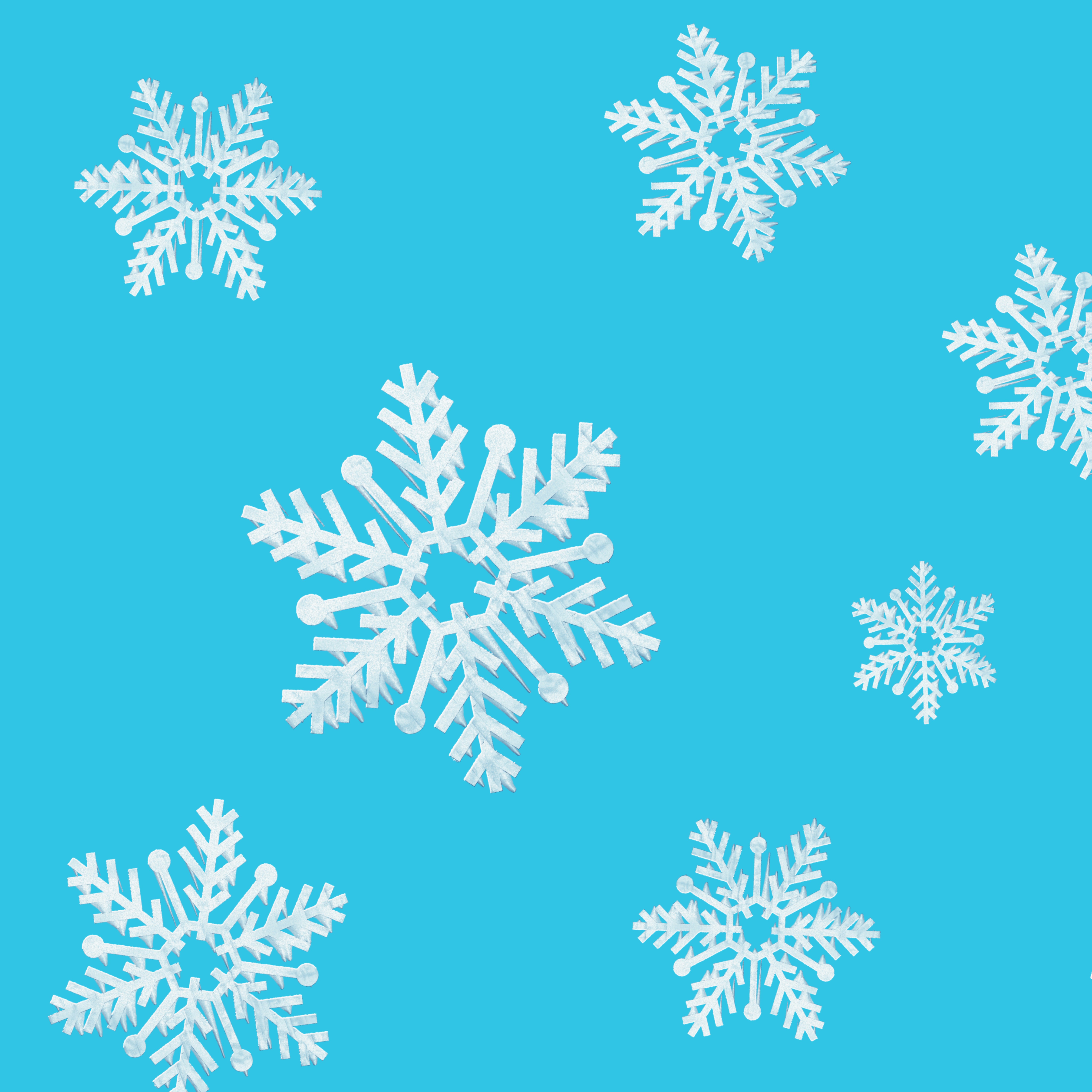 White snowflakes scattered on a blue background