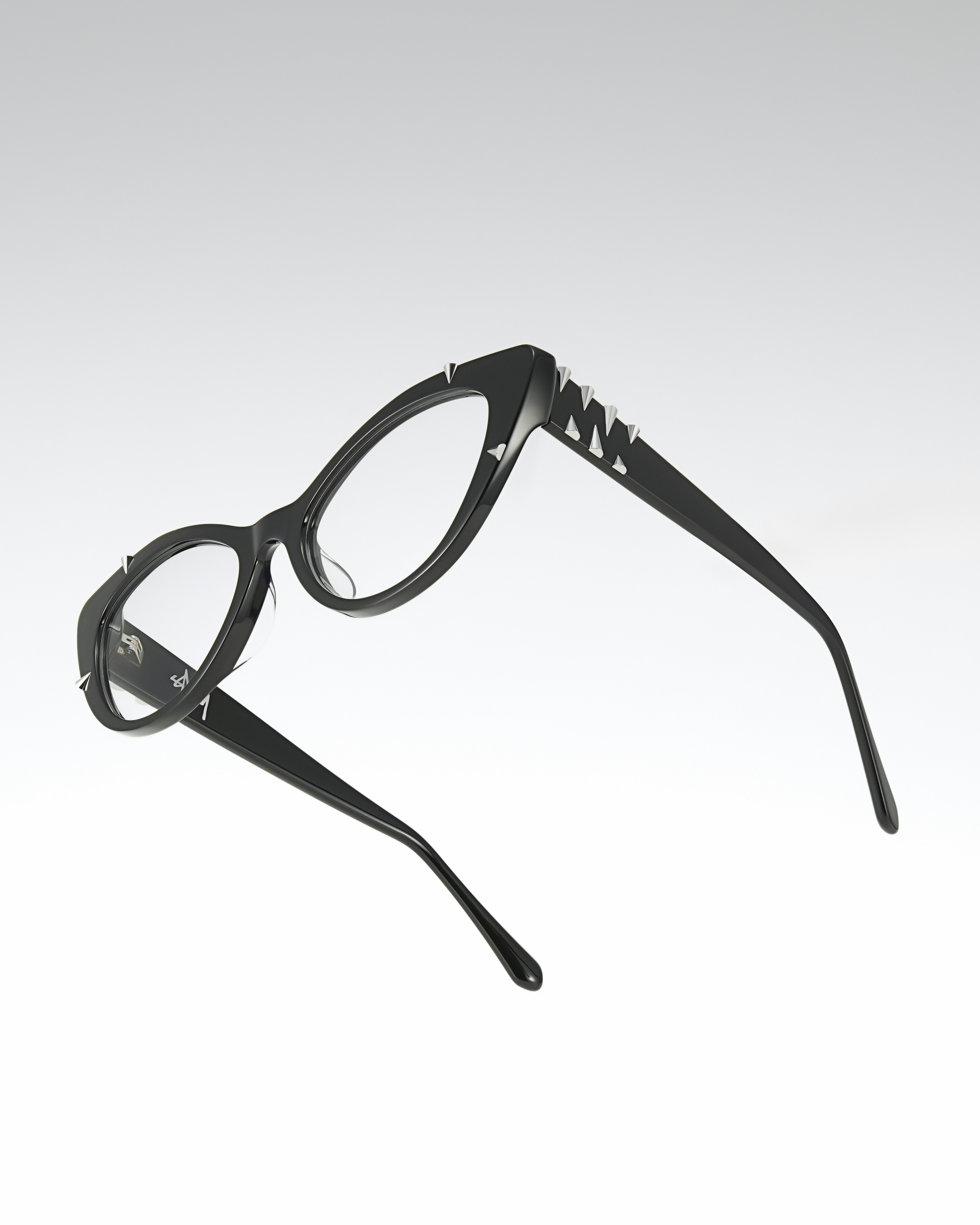 Stylish black cat-eye glasses with silver accents
