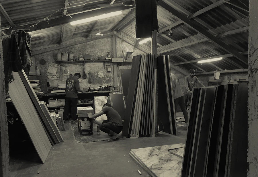 Workers in an Indian electrical workshop