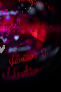 Valentine's day hearts and text on black background