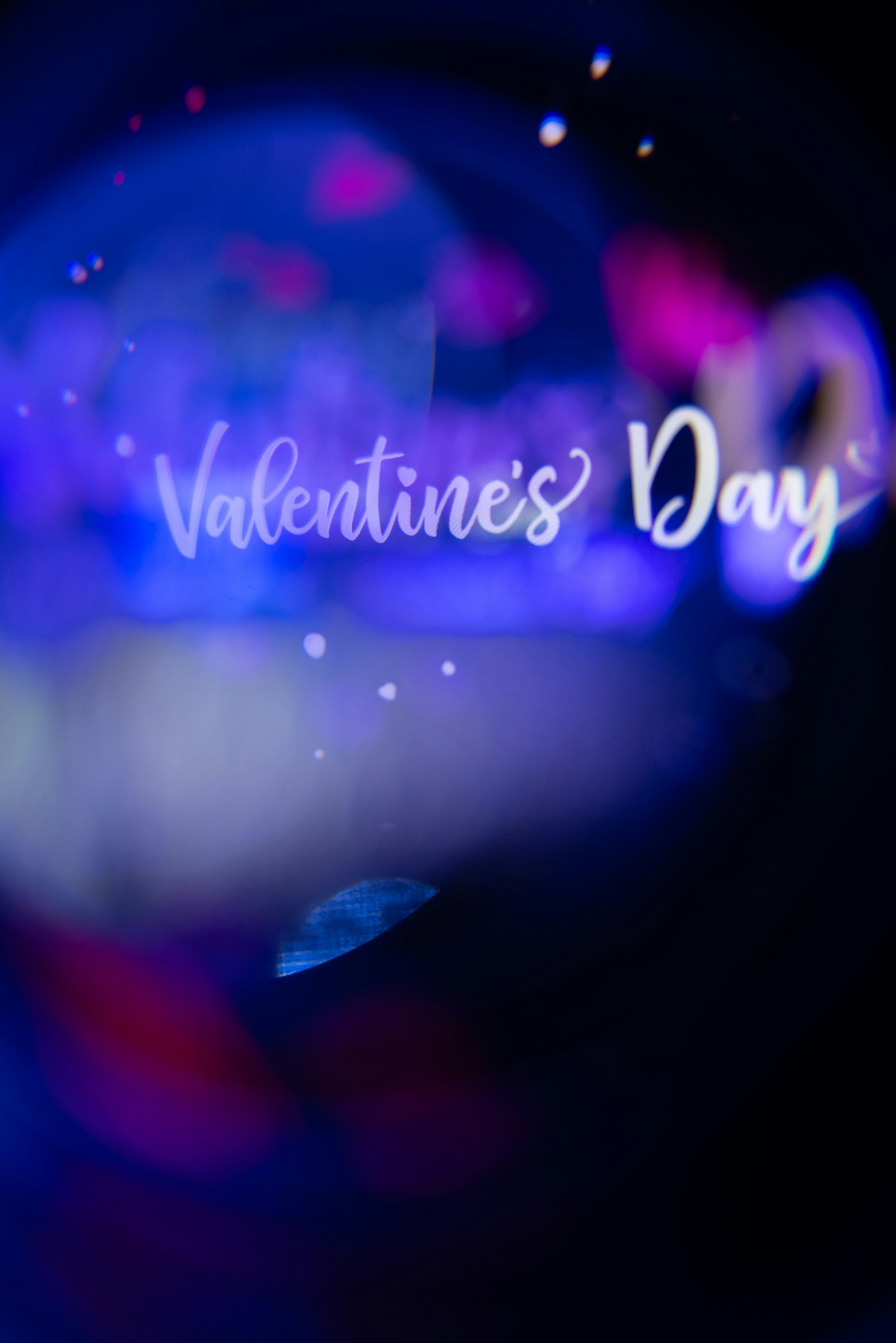 Valentine's day text with bokeh lights