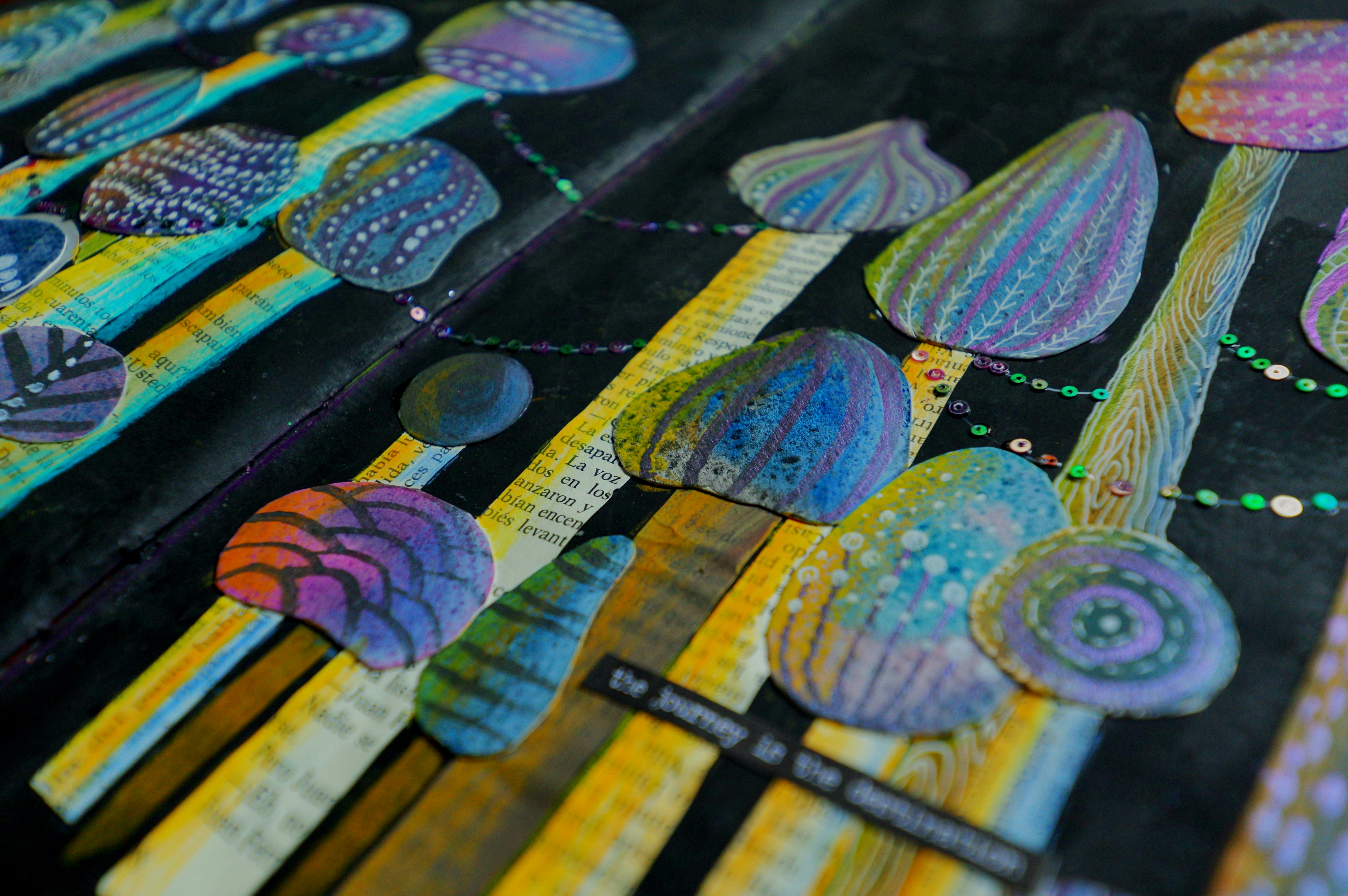 Colorful abstract art with textured elements on black background