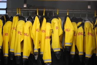 Yellow rnli jackets hanging on a rack