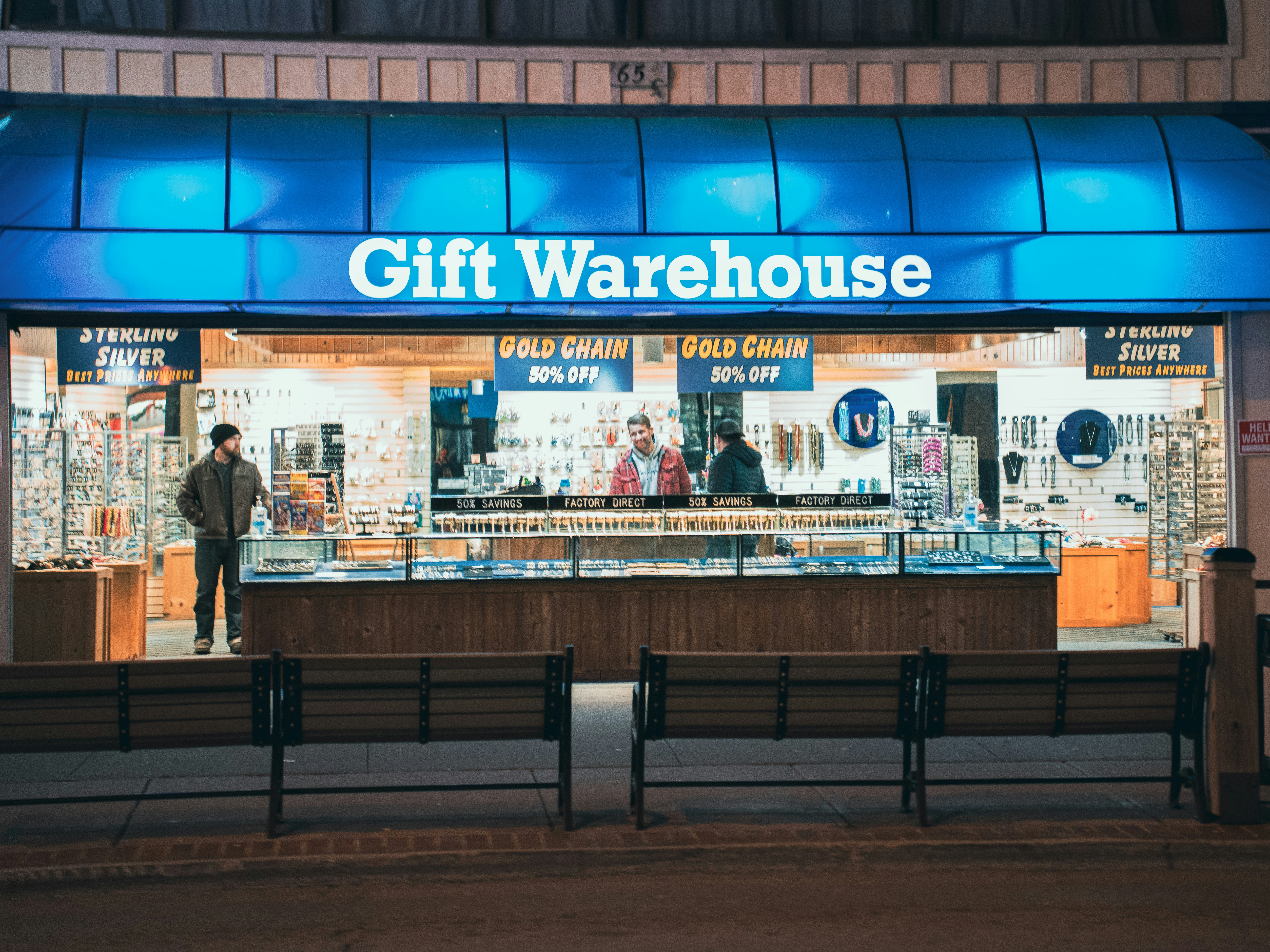 Gift warehouse store at night with people inside