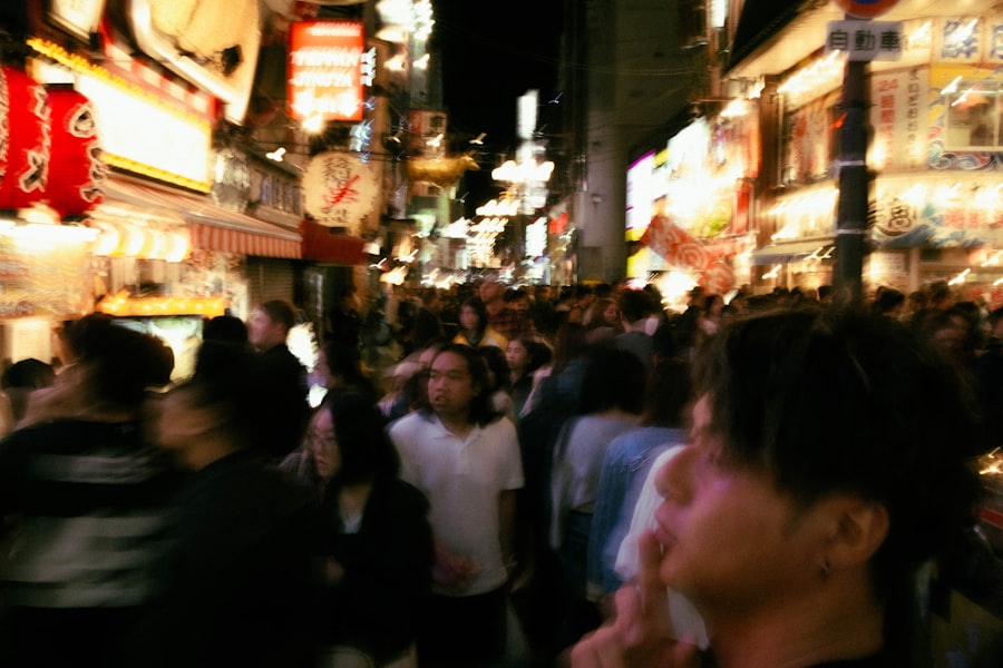 Late-night shoppers browsing densely packed book stalls
