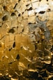 Abstract texture of golden crumpled foil.