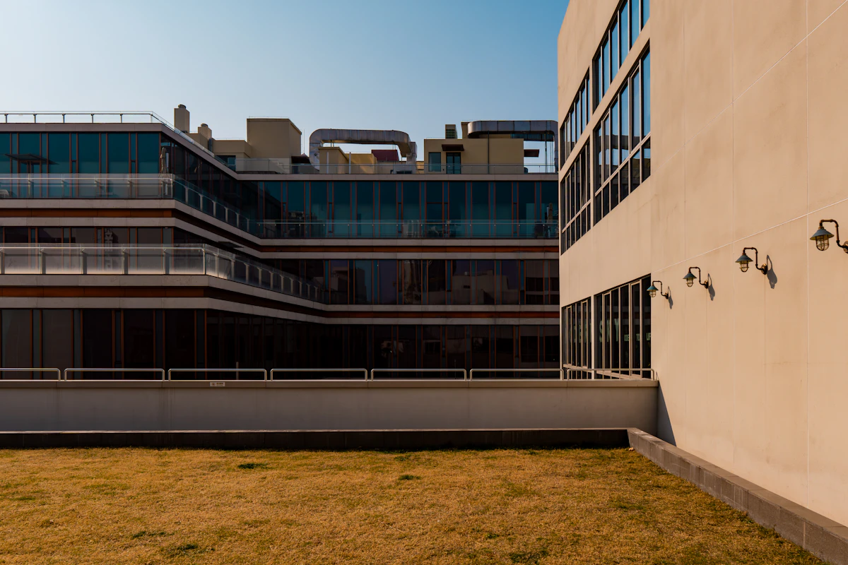 Modern commercial building with maintained grass and landscape areas