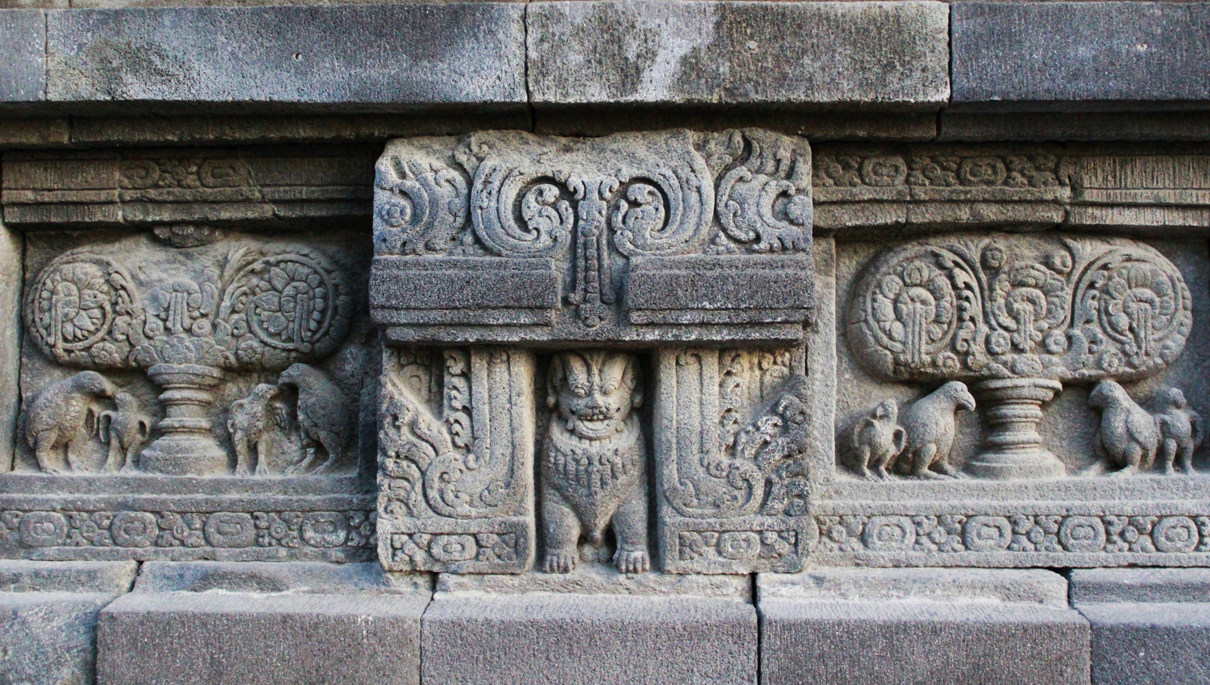 Ancient stone carvings of animals and mythical creatures