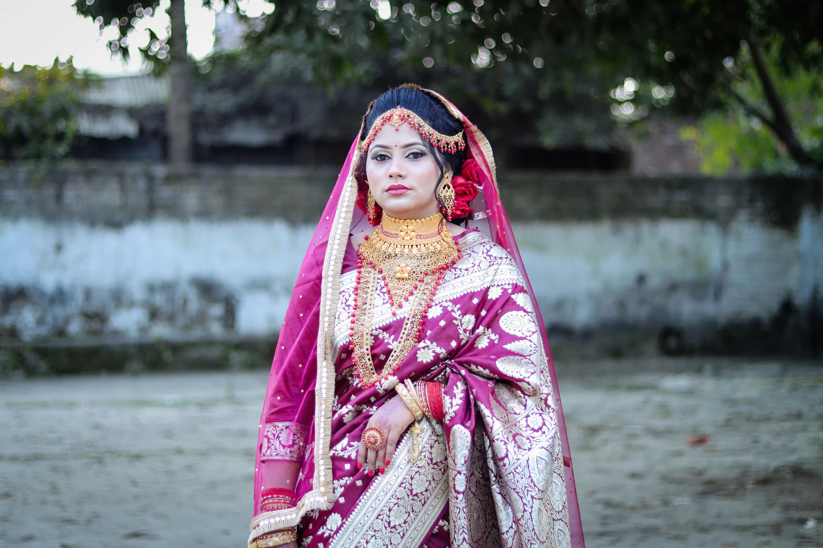 South Indian bride adorned with gold temple jewellery