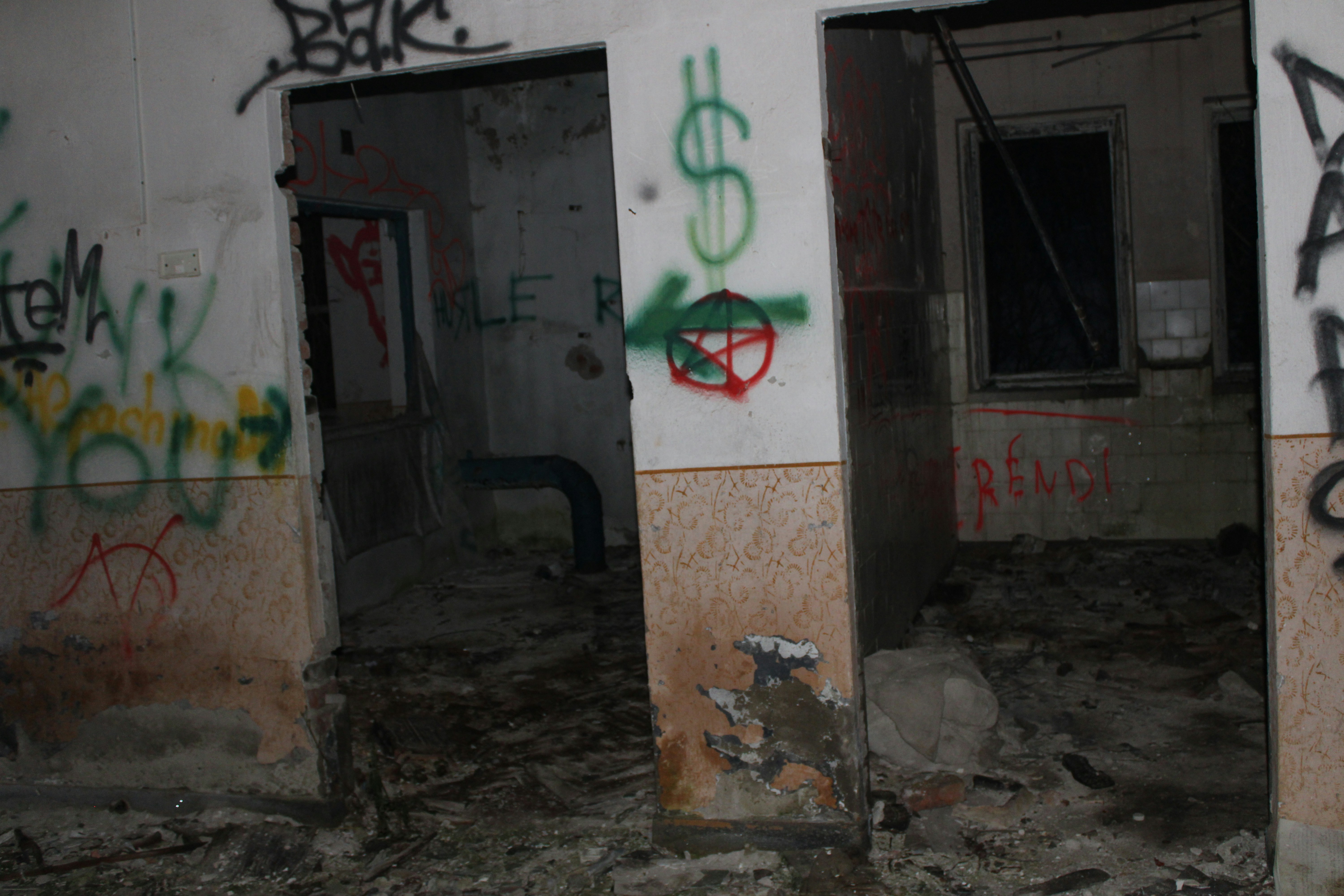 Graffiti-covered interior of an abandoned building
