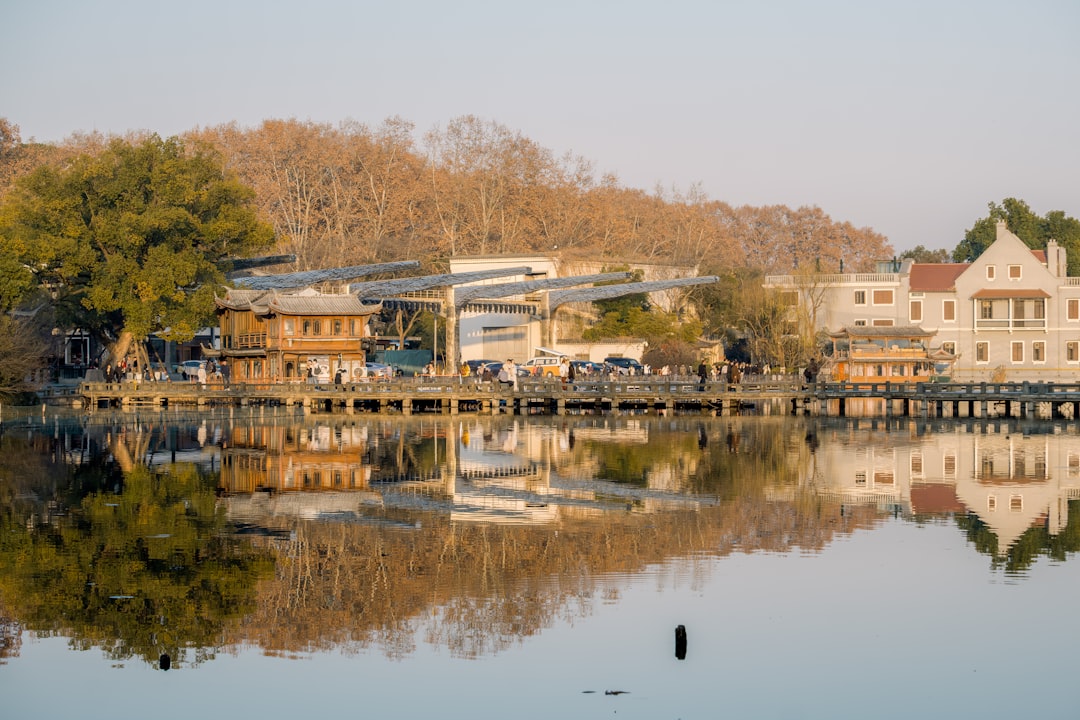 Chinese lake scenery with pavilions and walking paths