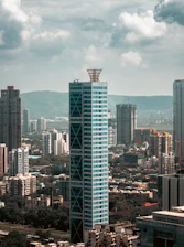 Modern skyscrapers in a bustling city skyline.