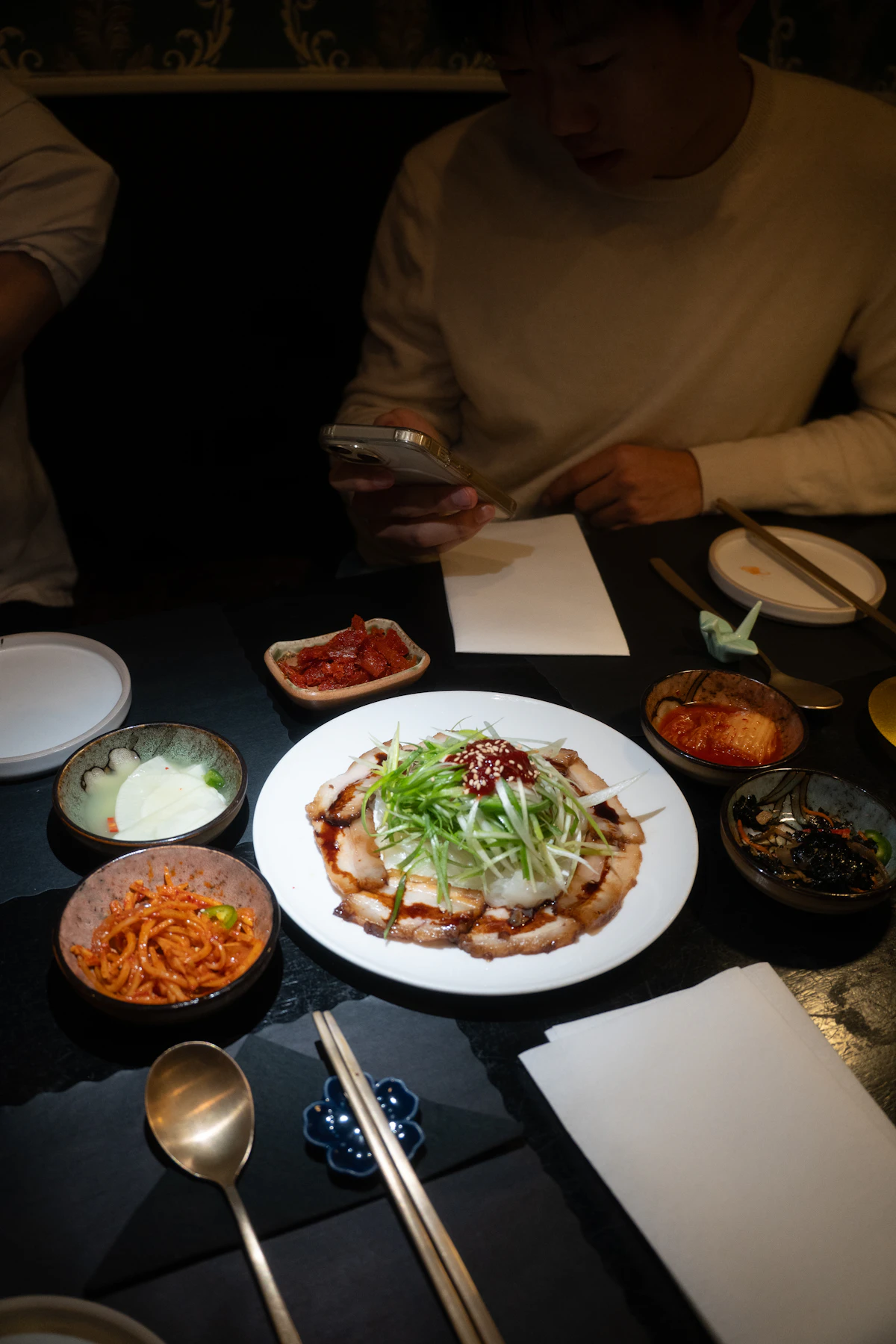 A table of Korean dishes and side dishes