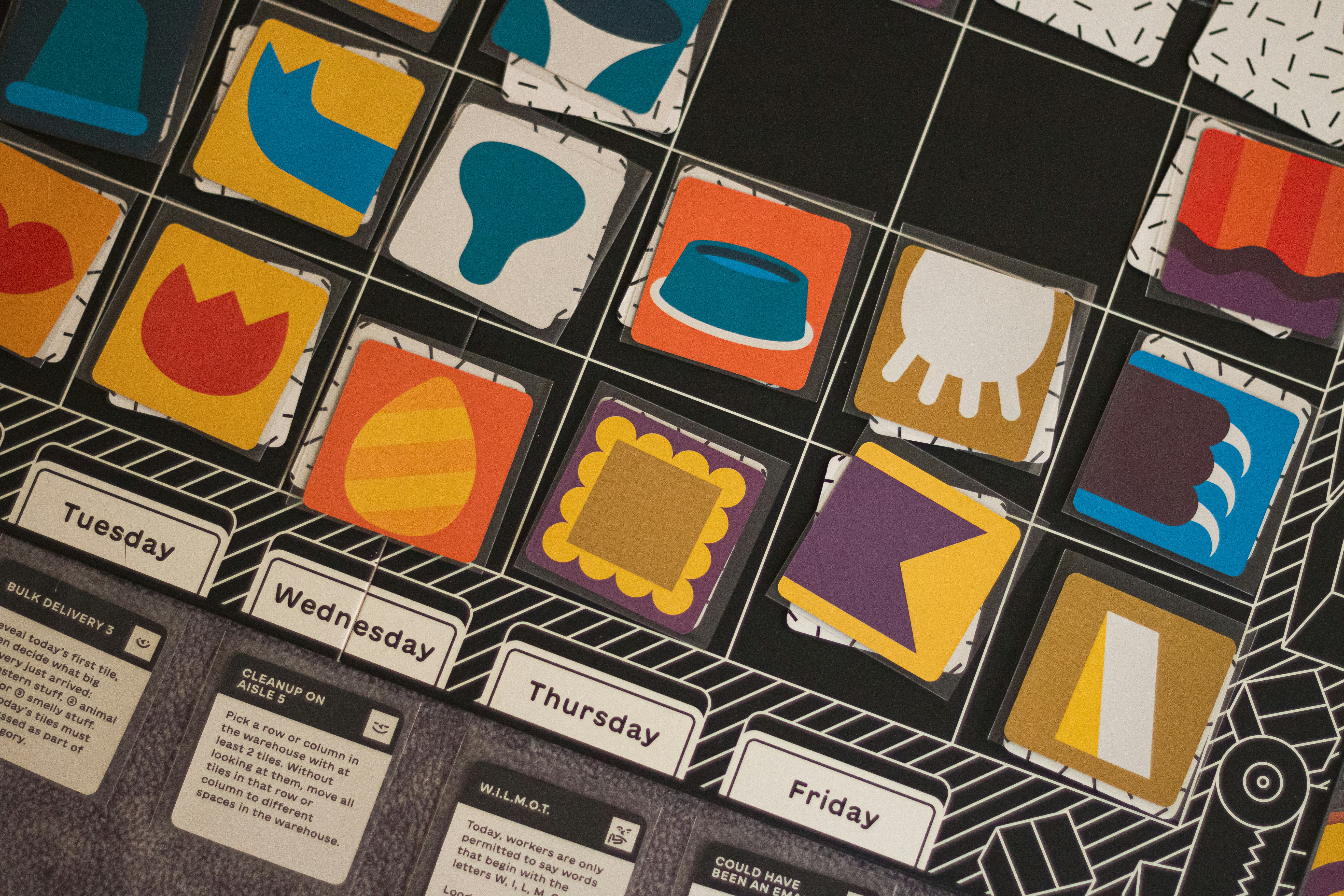 Colorful icons on a grid with days of the week.