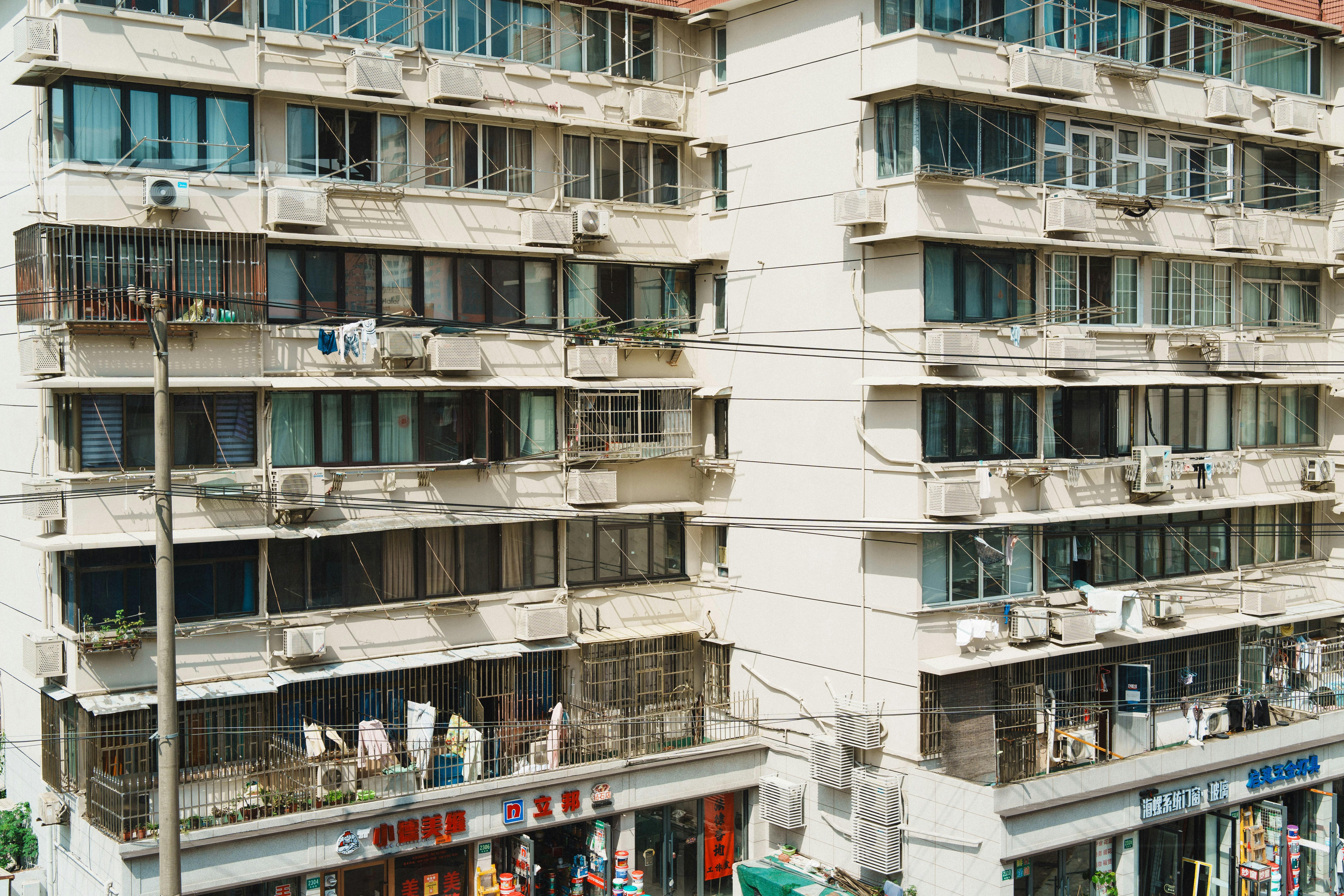 Apartment building with many windows and balconies