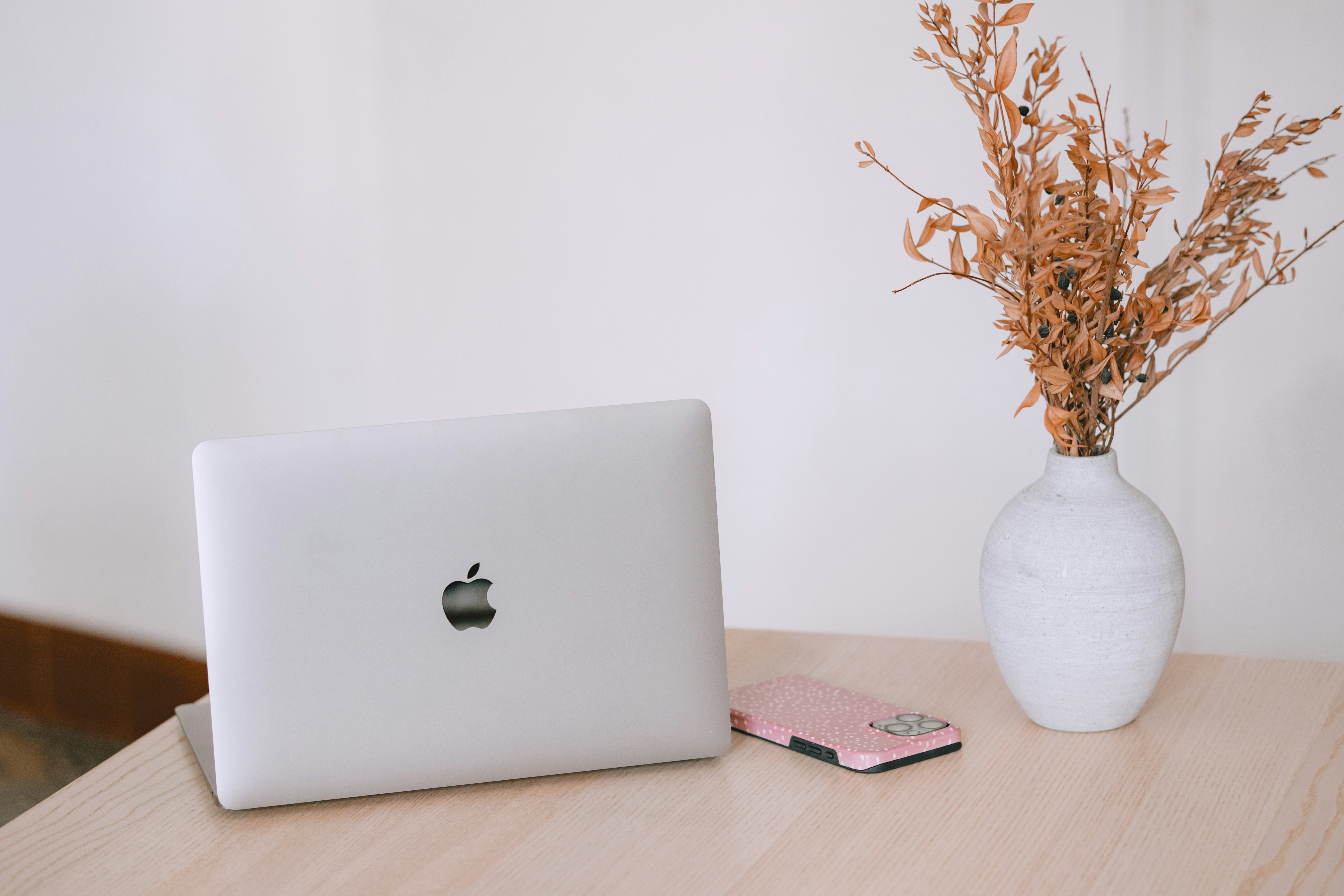 Apple MacBook Pro laptop open on modern desk workspace