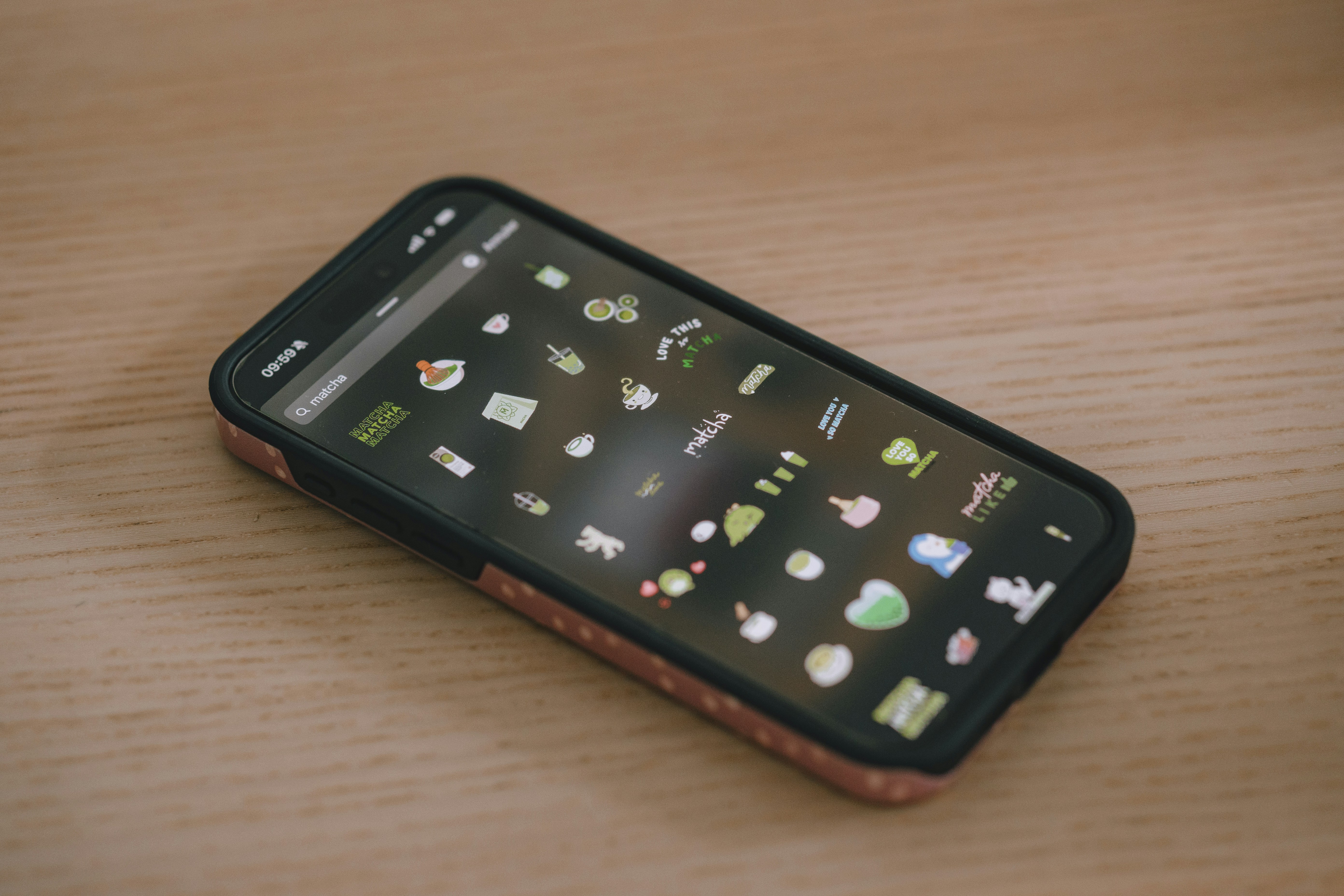 A smartphone with many app icons displayed.