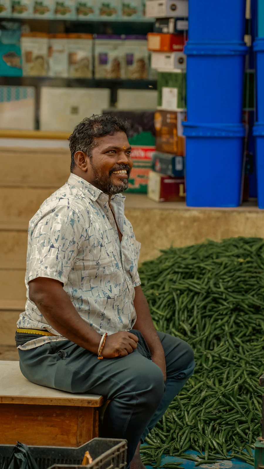 A vegetable seller at an Indian market