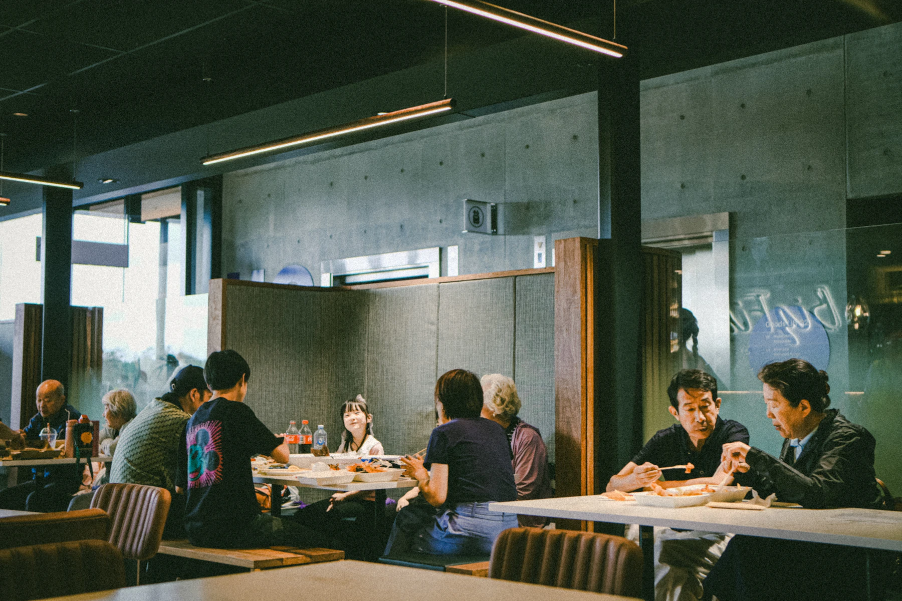 People dining together in a lively restaurant