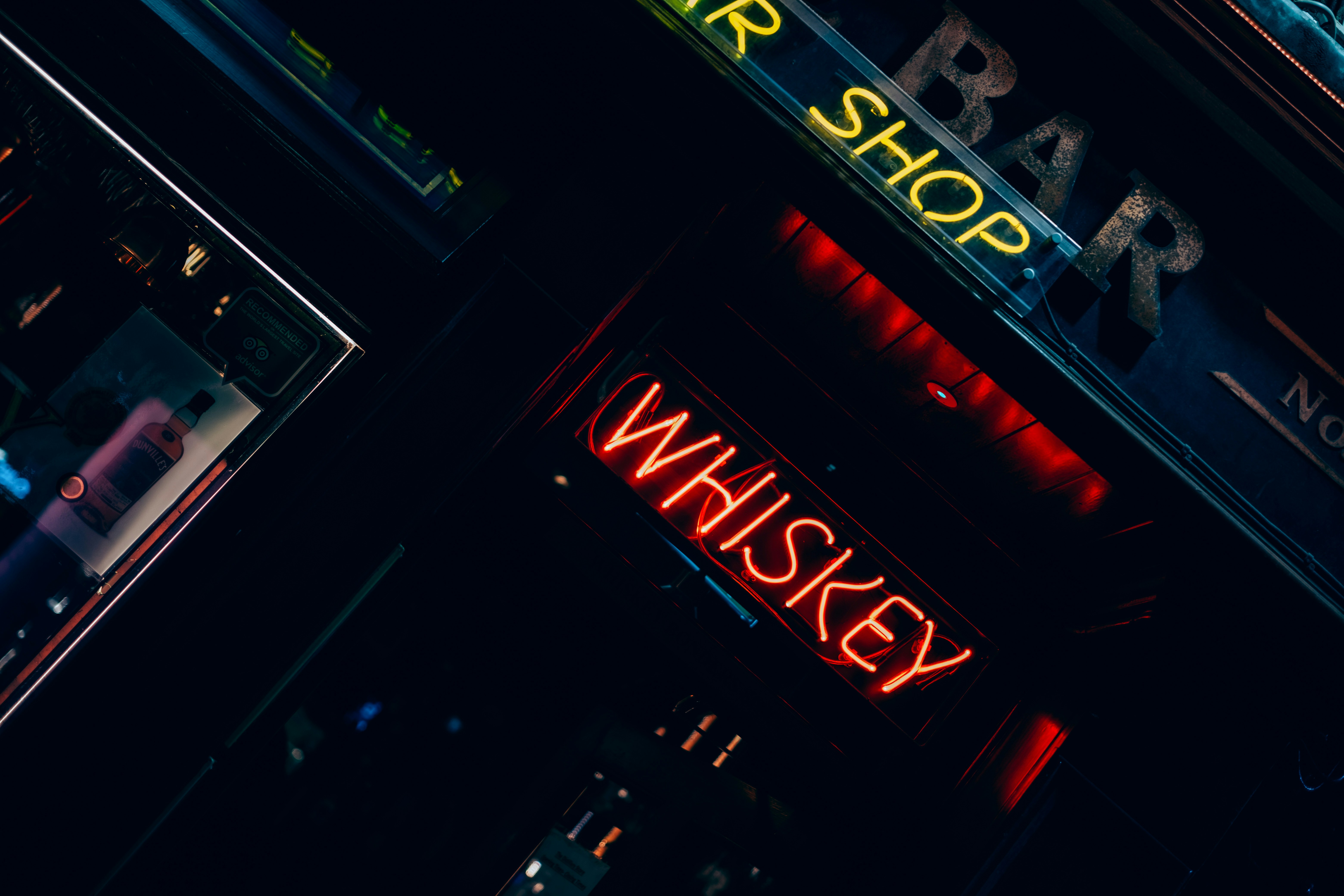 A welcoming and cozy whiskey shop interior.