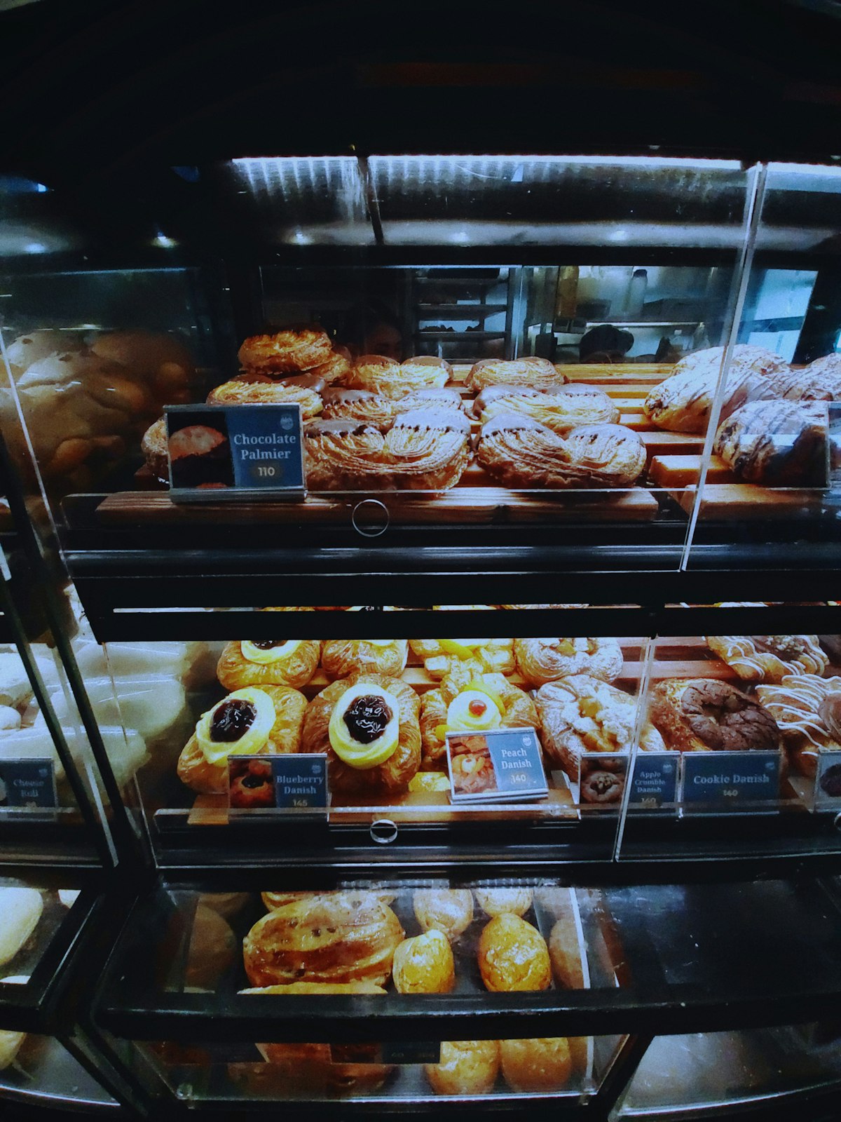 Danish pastries in a bakery case