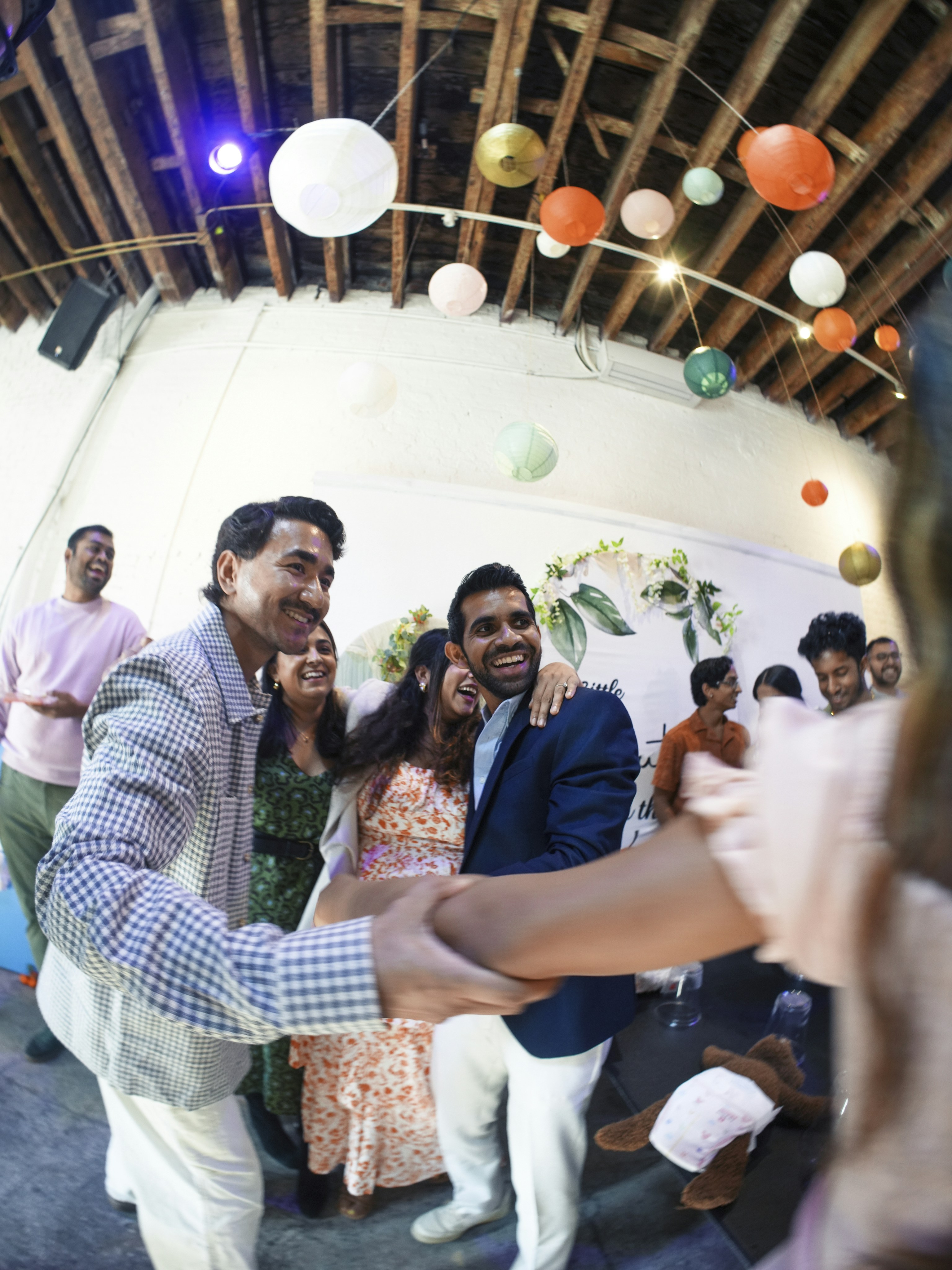 People dancing and celebrating at a party.