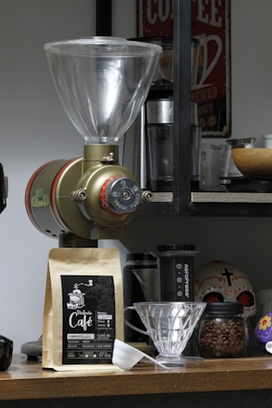 Coffee grinder filled with whole coffee beans