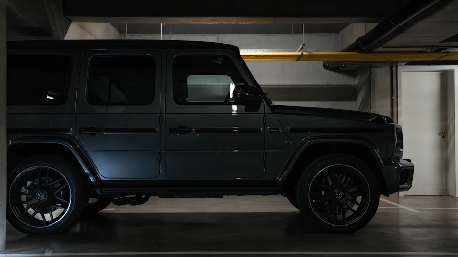 Black extended SUV parked in garage