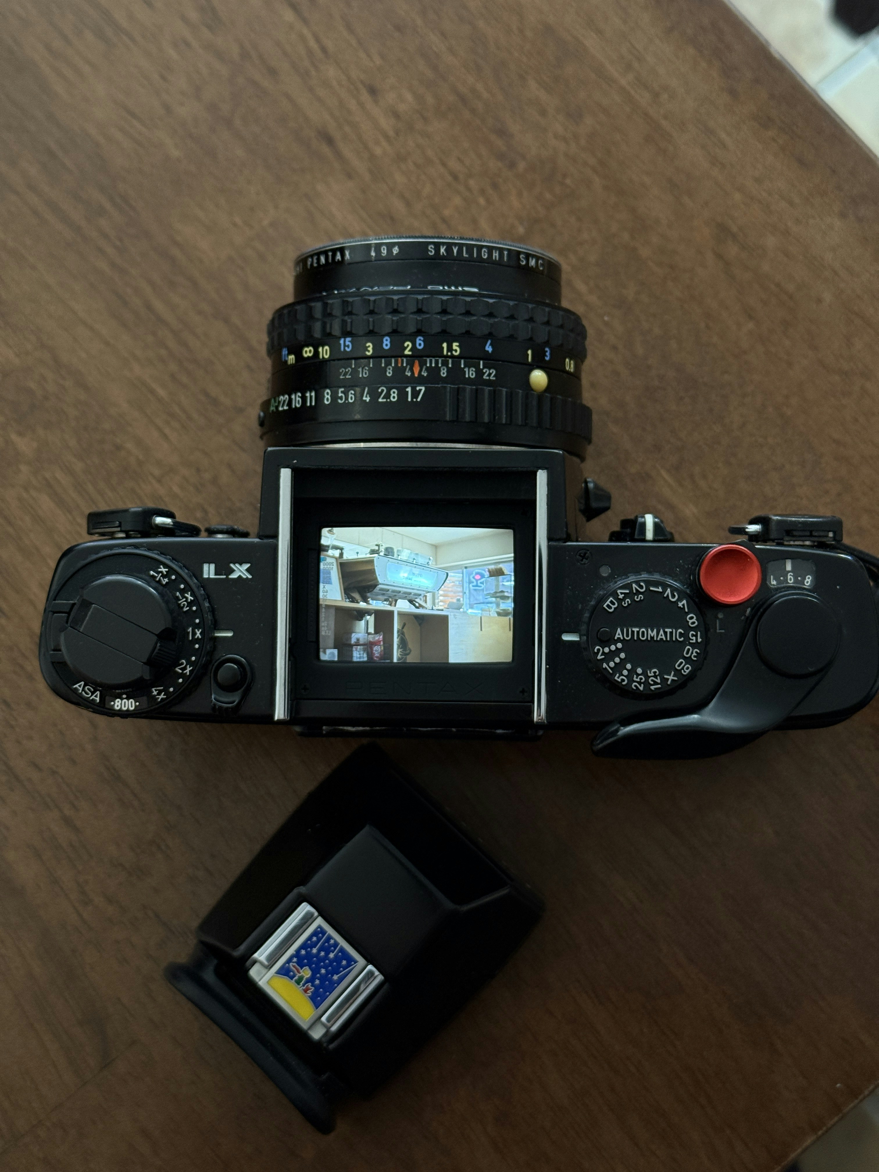 Vintage camera with lens and viewfinder attachment