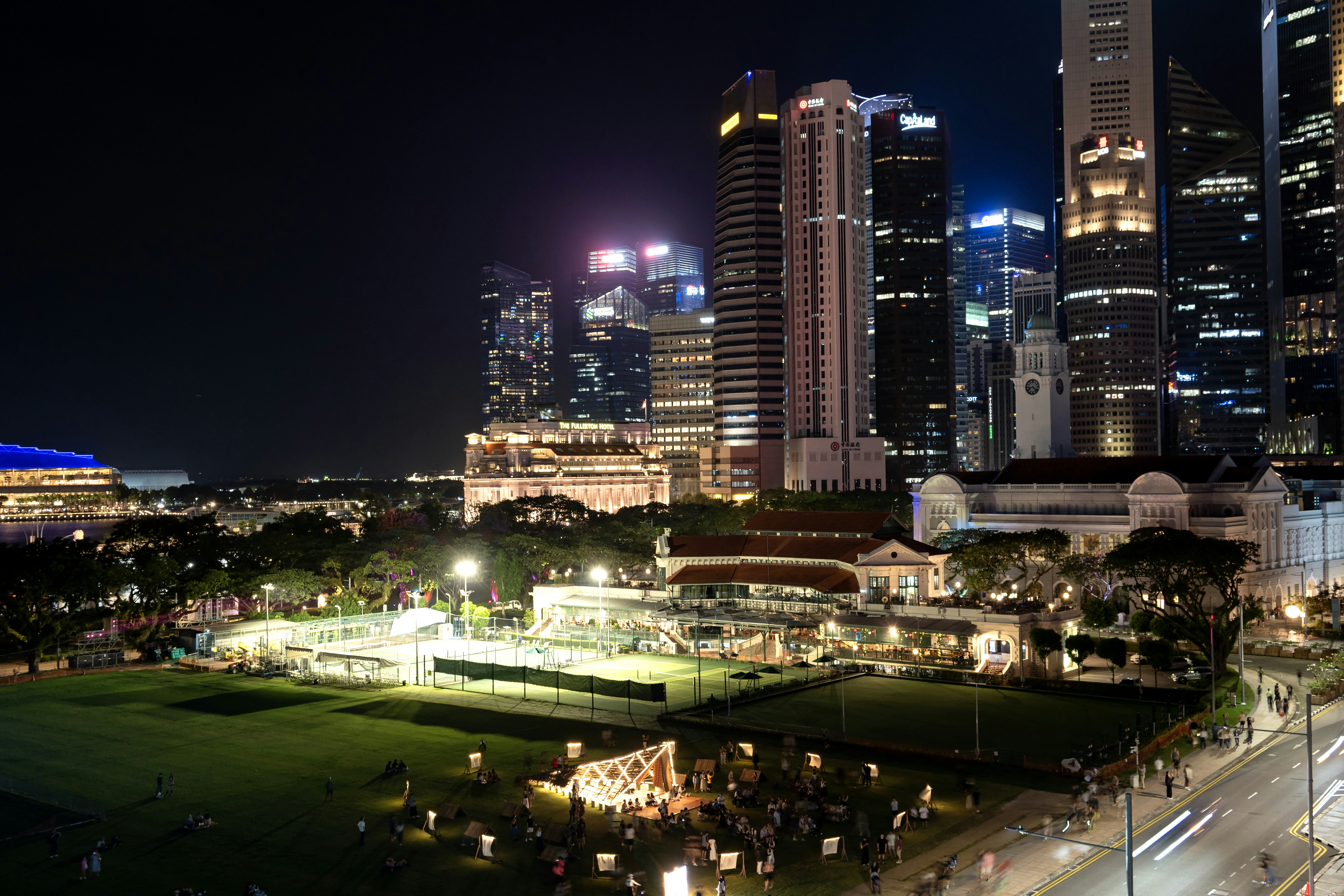 Vibrant cityscape with illuminated buildings at night